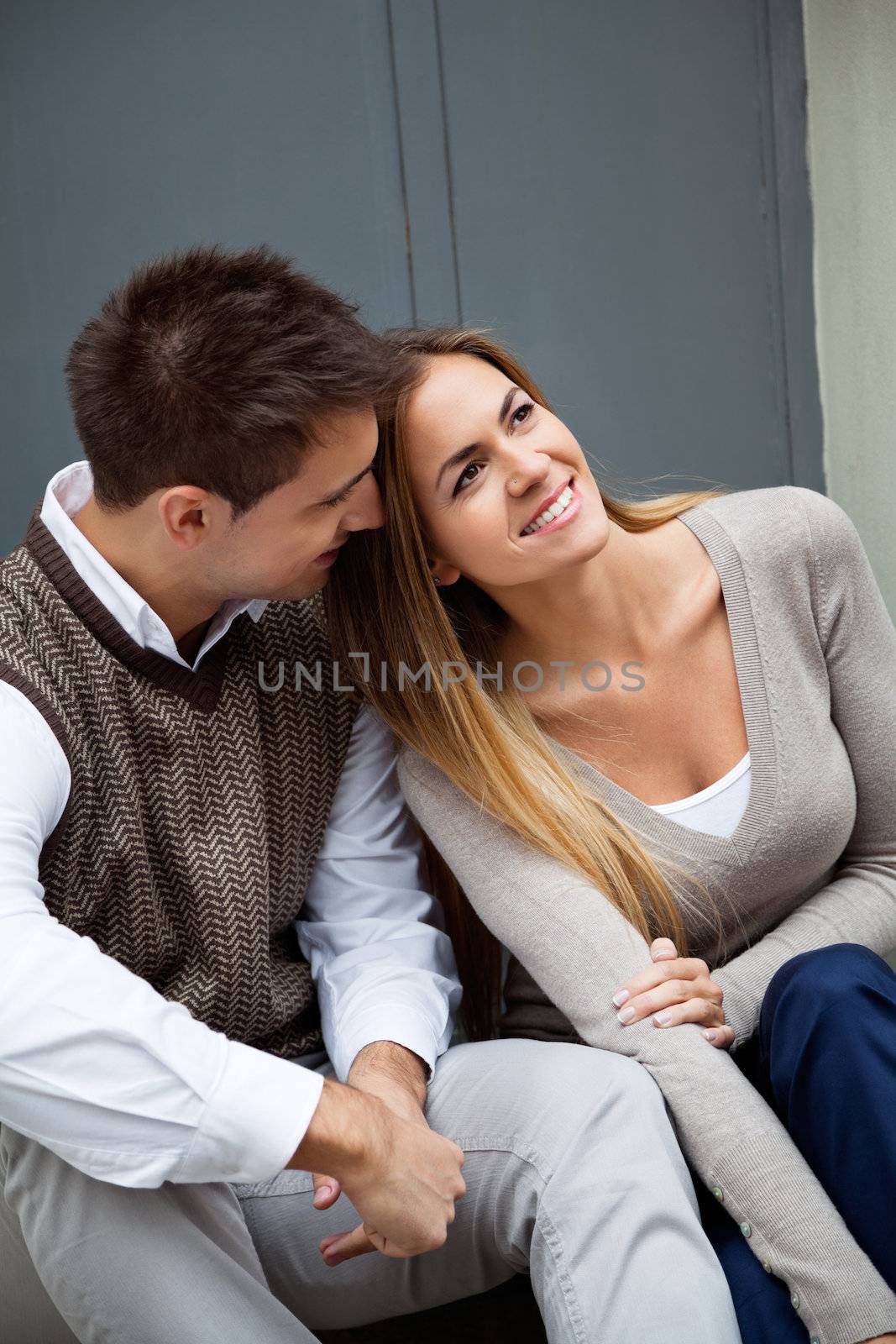 Couple Sitting Together by leaf