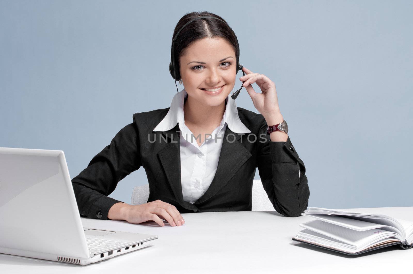 Business woman with headset communication by markin