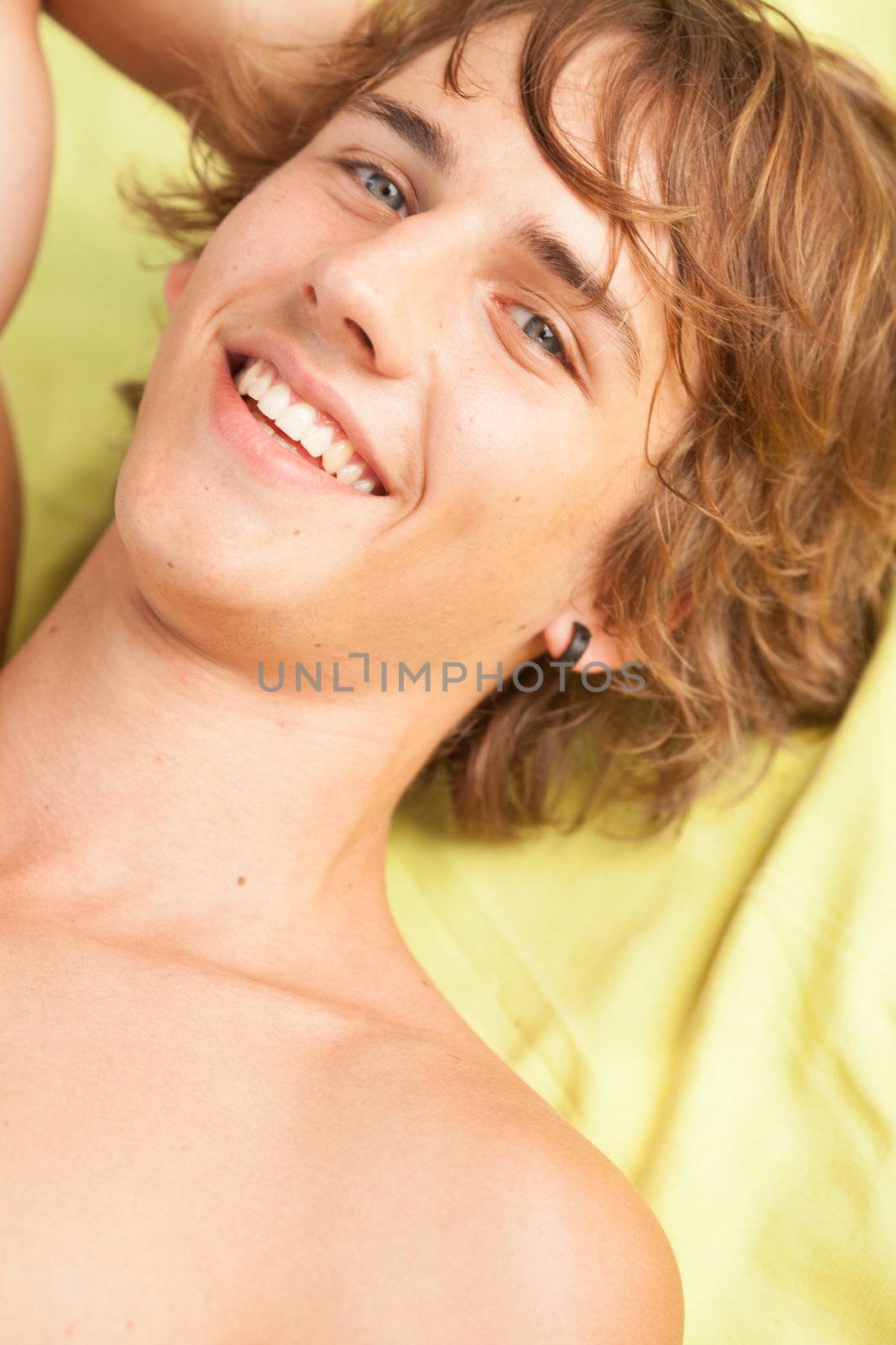 young beautiful man portrait smiling by Lcrespi