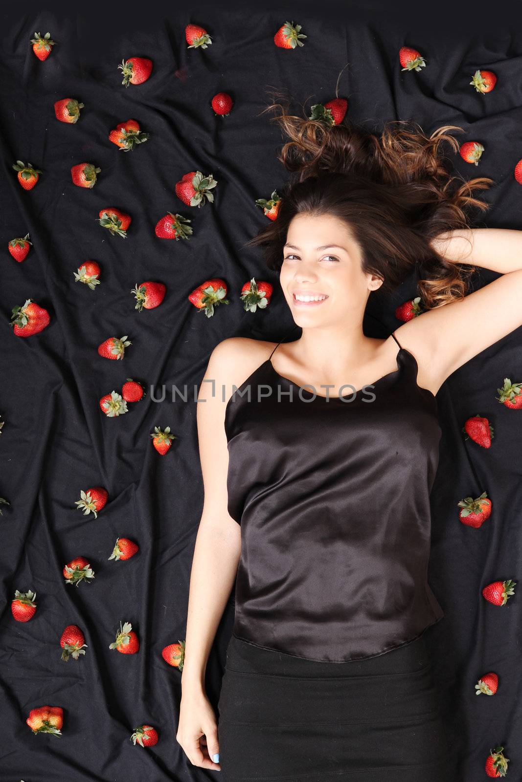 A young adult american woman dreaming of strawberries.