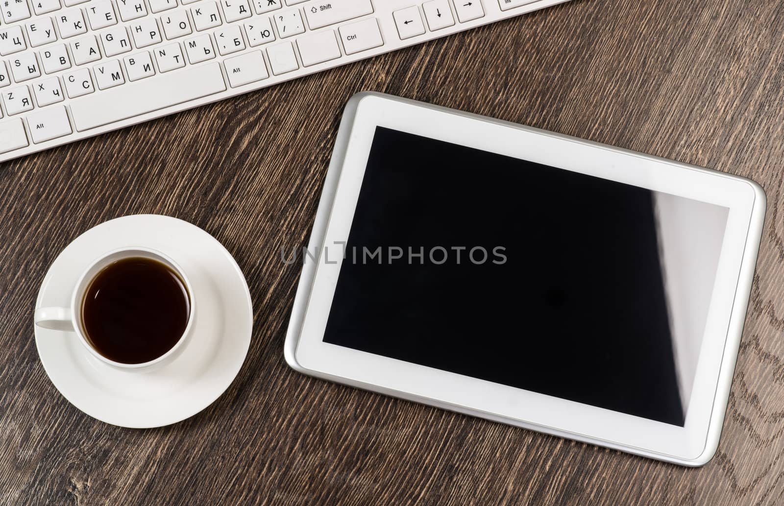 tablet, keyboard, cup of coffee, still life