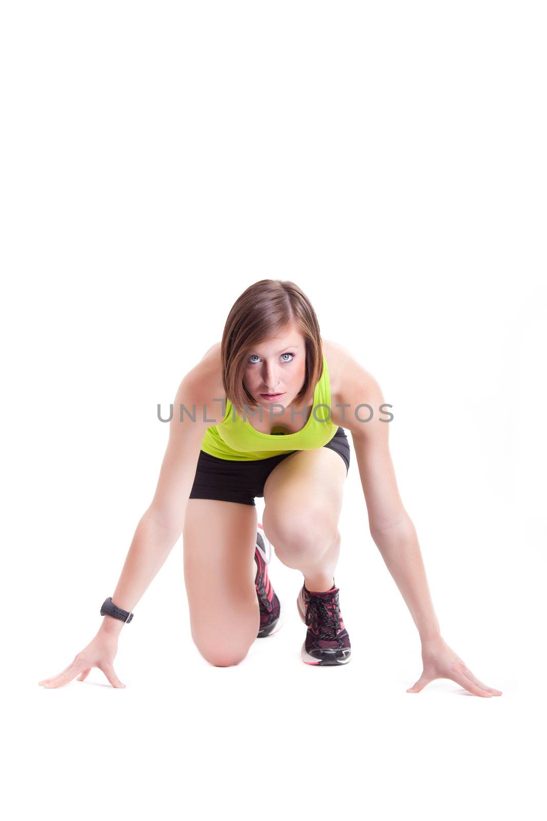 young beautiful sport woman ready for a race isolated on white background