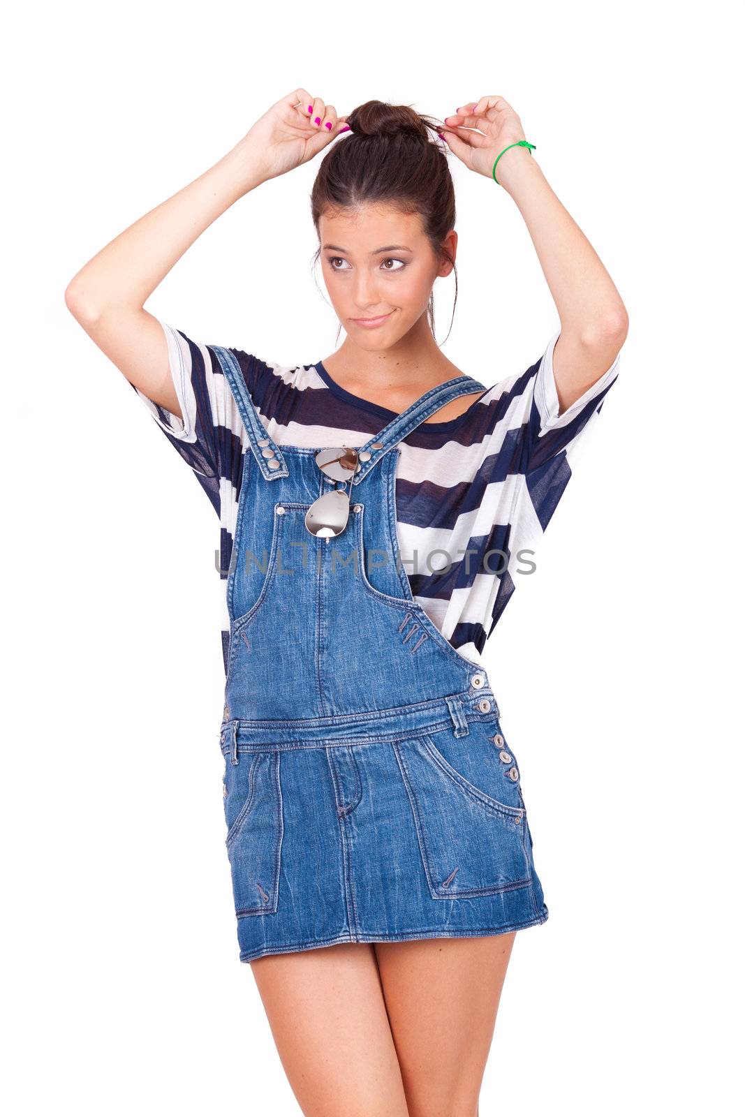 Portrait of a young women making funny face on white background