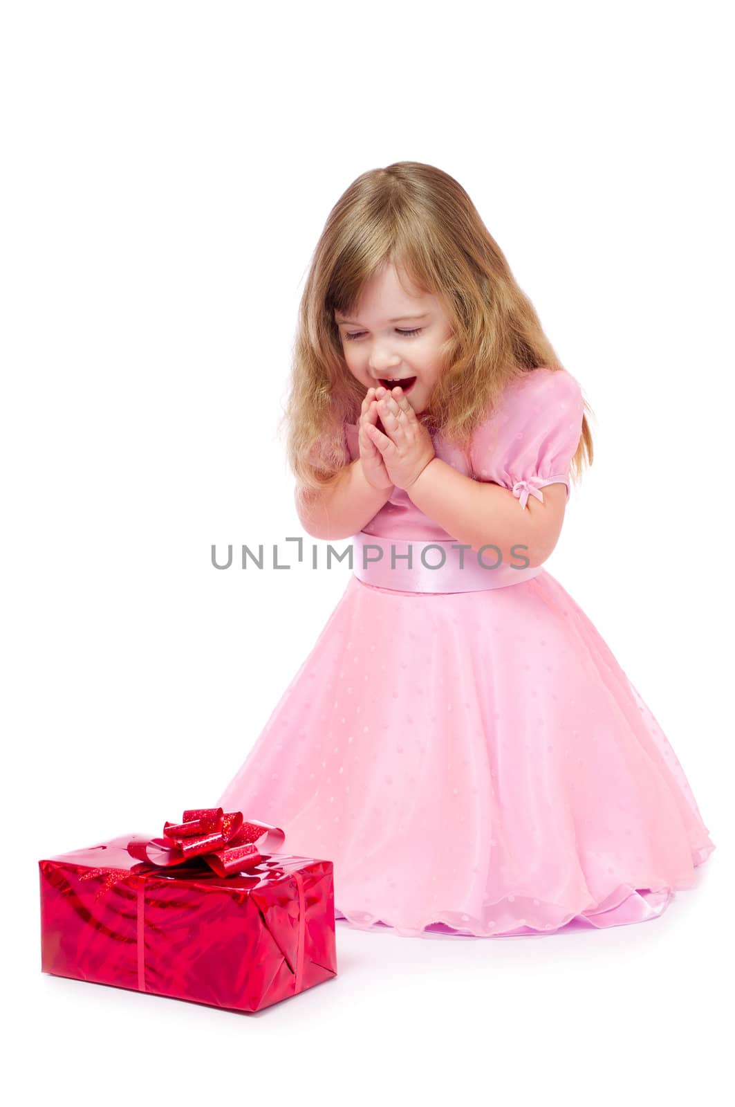 Little girl with gift box isolated