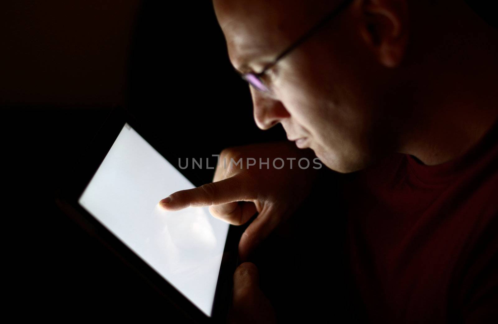 man using a tablet PC