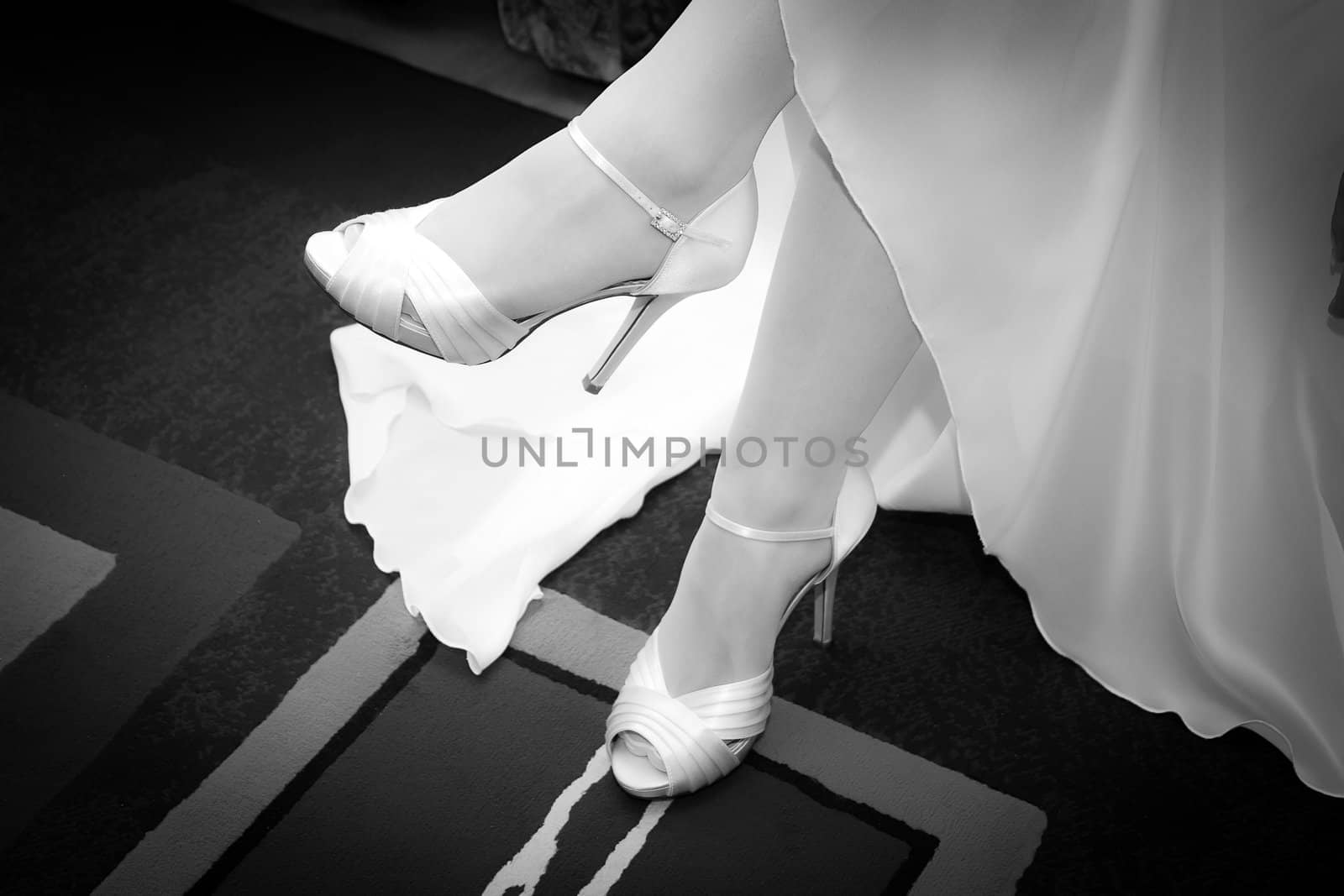 Bride legs with high heels shoes