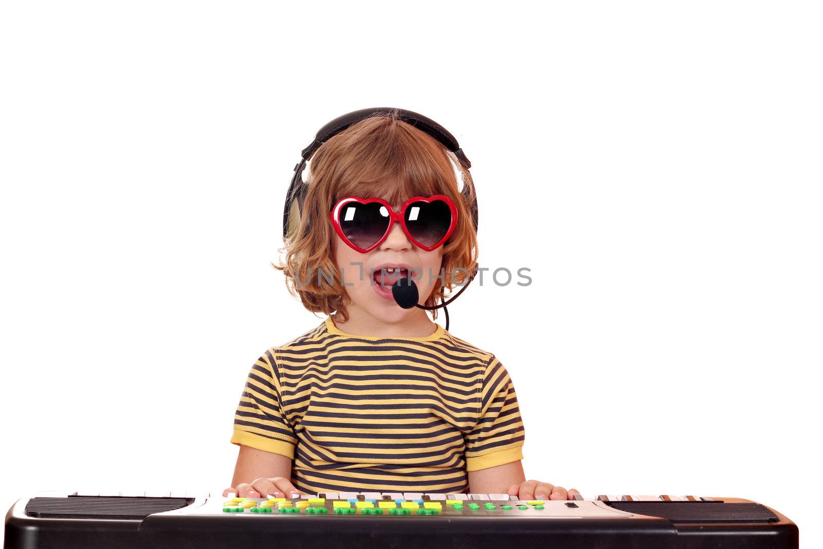 happy little girl play music and sing