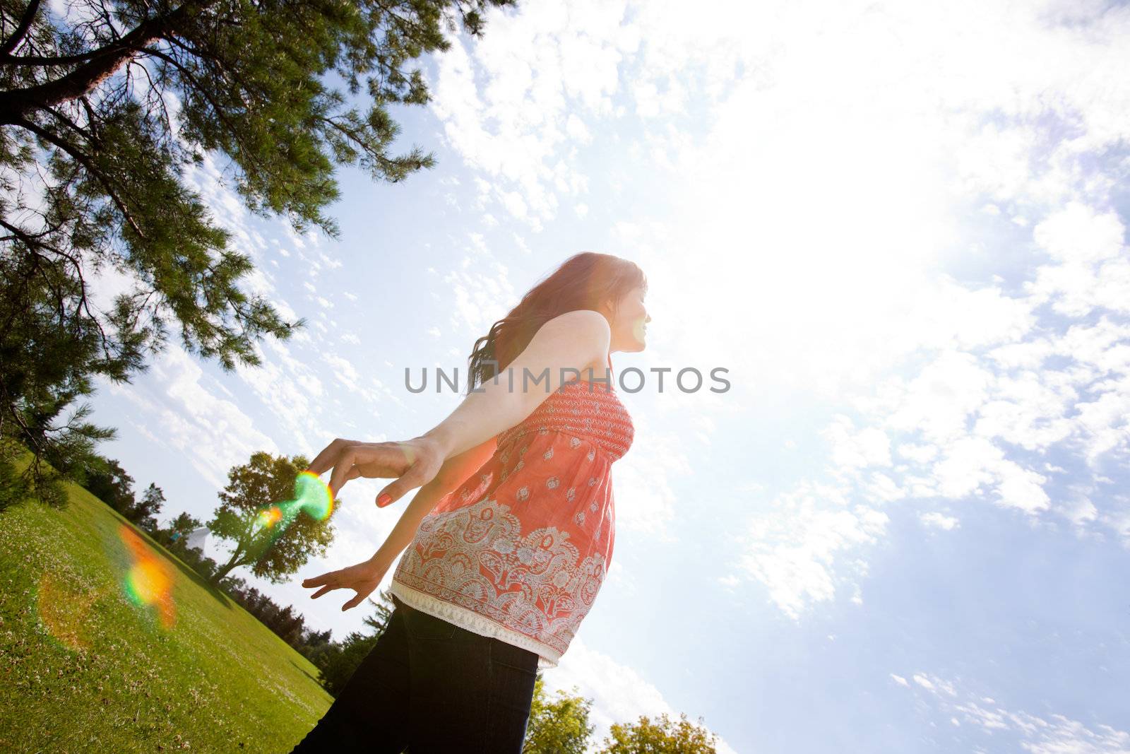 Pregnant Woman Outdoors by leaf