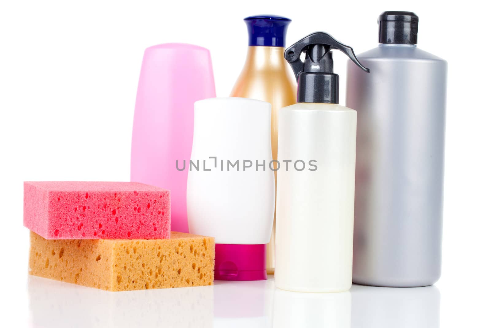 Sponge and cleaning items isolated on white