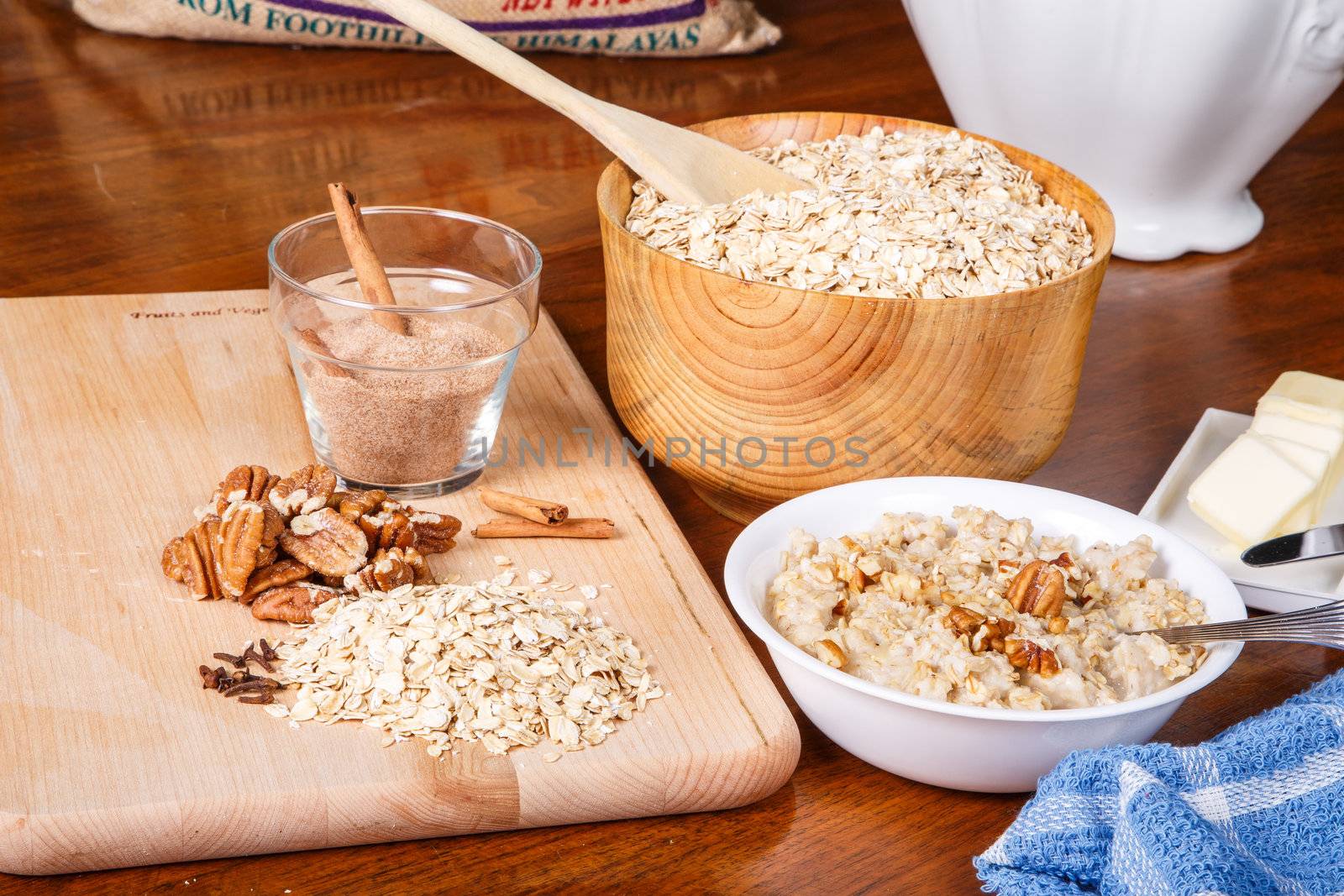 Ingredients on a table to prepare a hot bowl of oatmeal