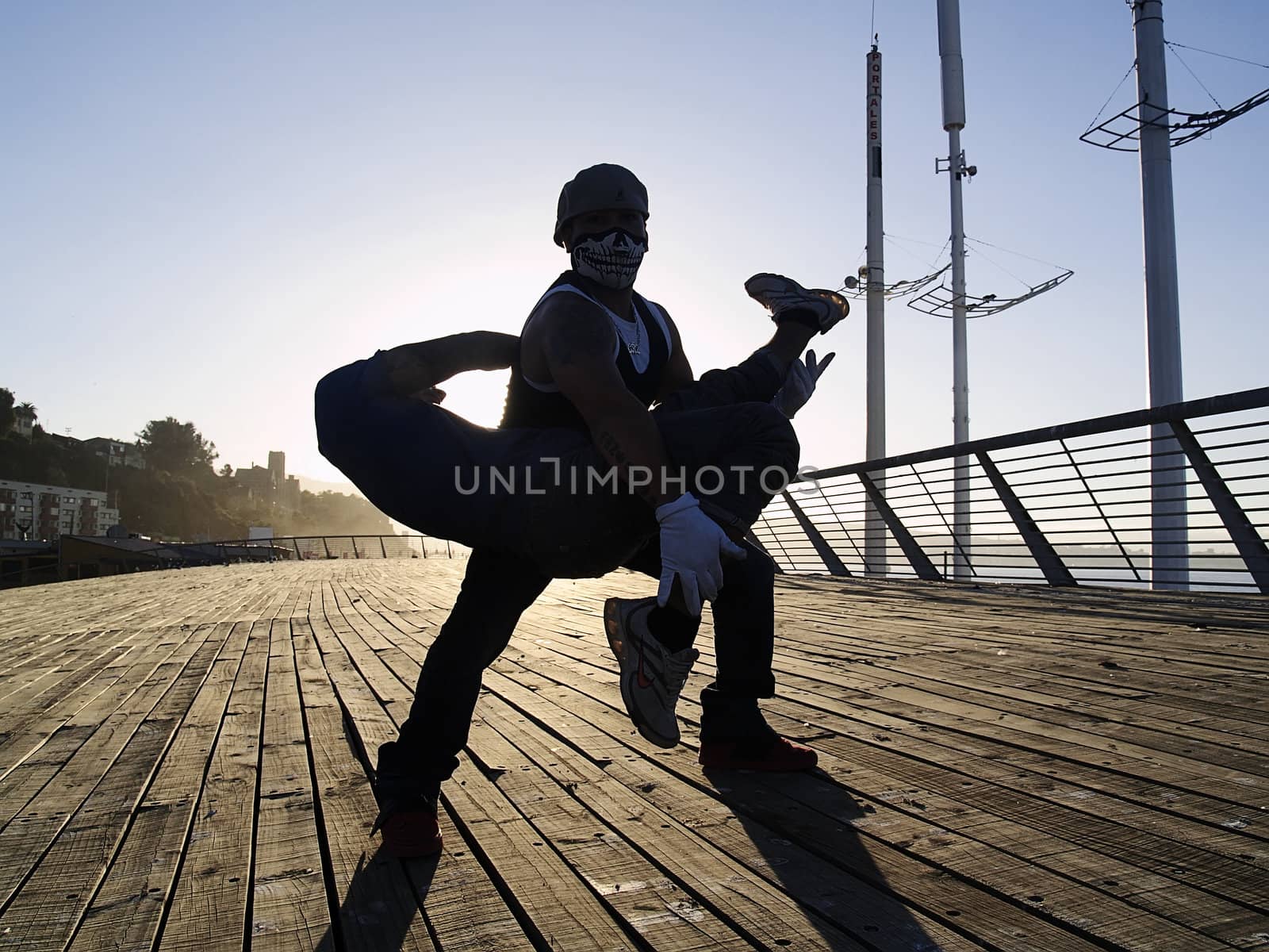 Silhouettes of poses of two rappers