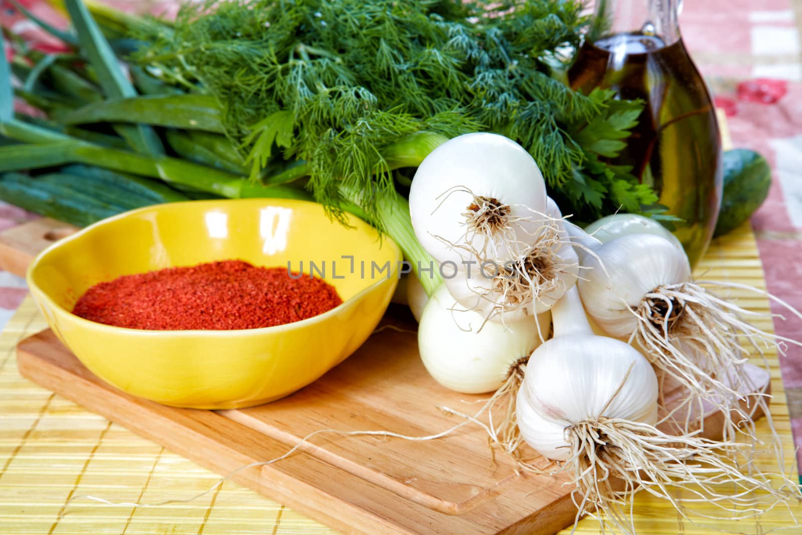 Still-life with vegetables spices and olive oil