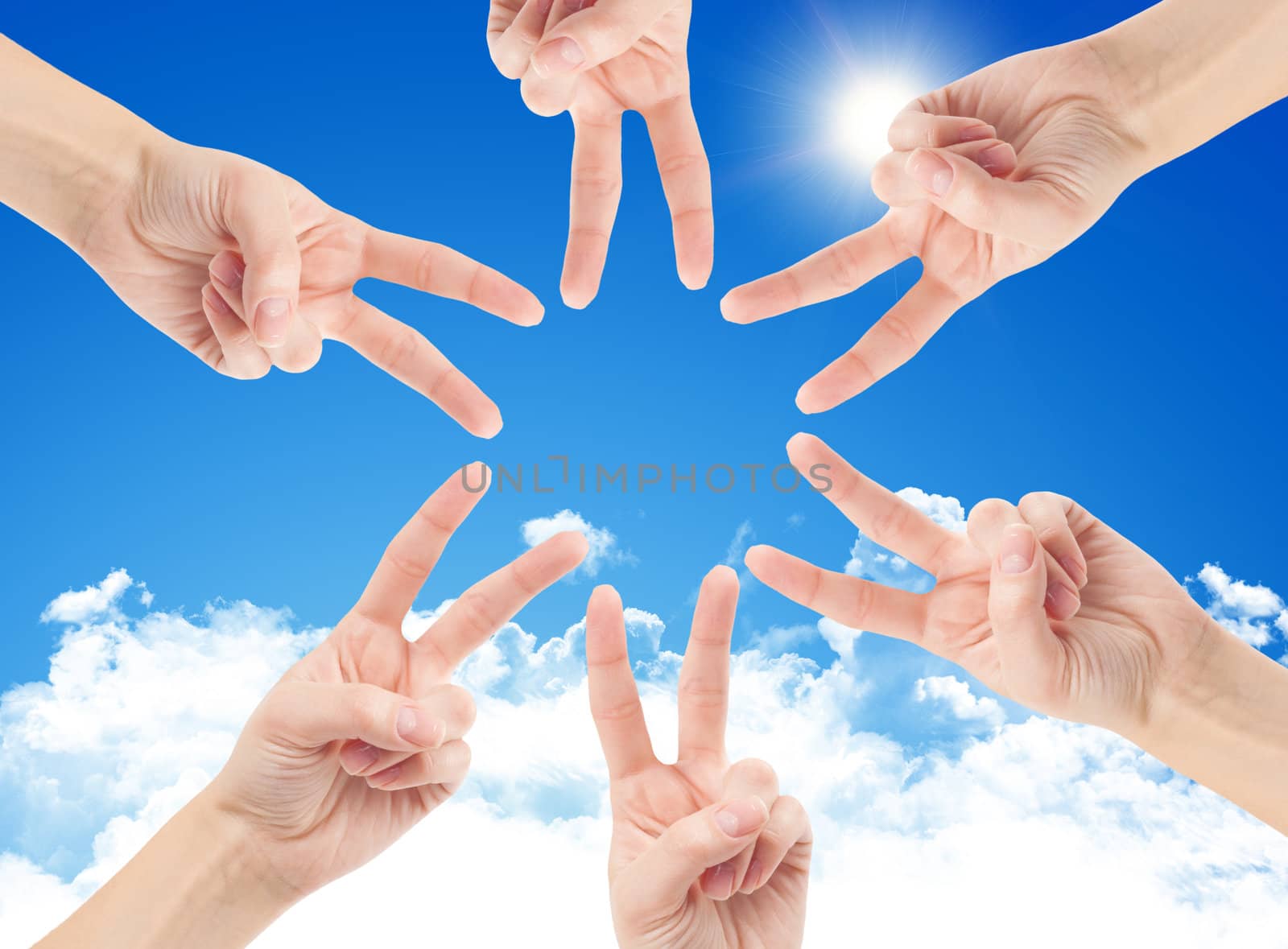 Hands of teamwork , forming the star shape