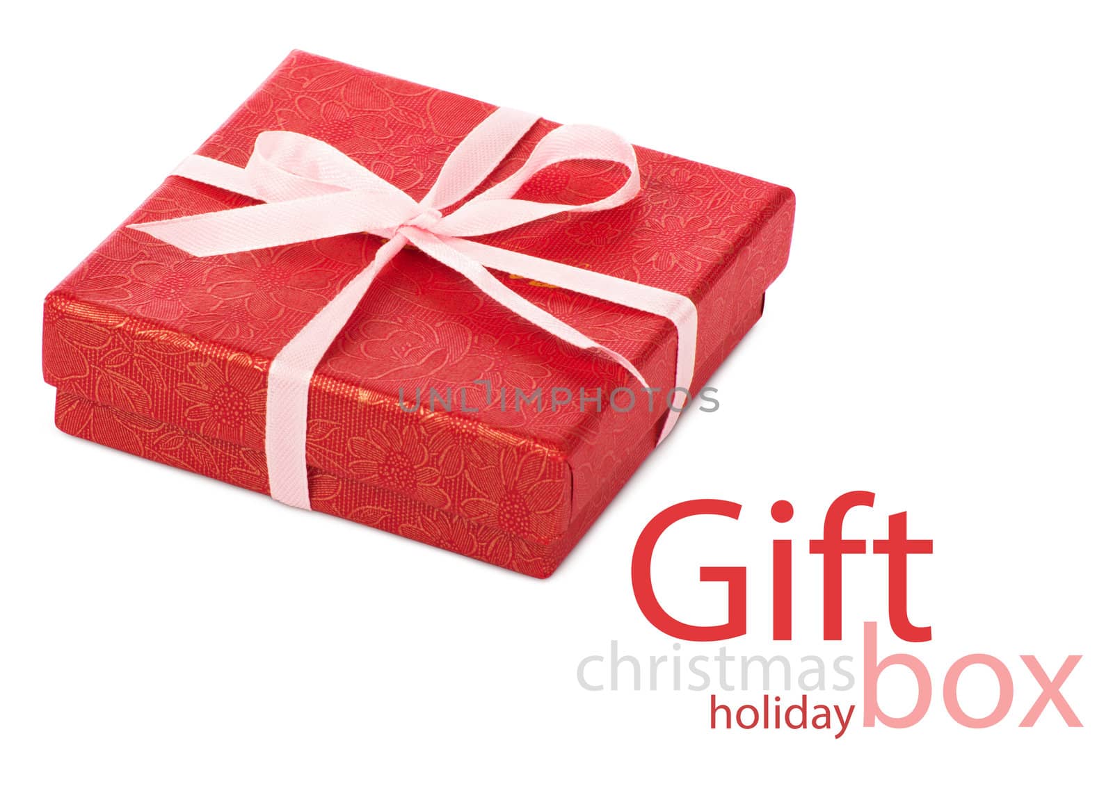 Single red gift box with pink ribbon on white background.