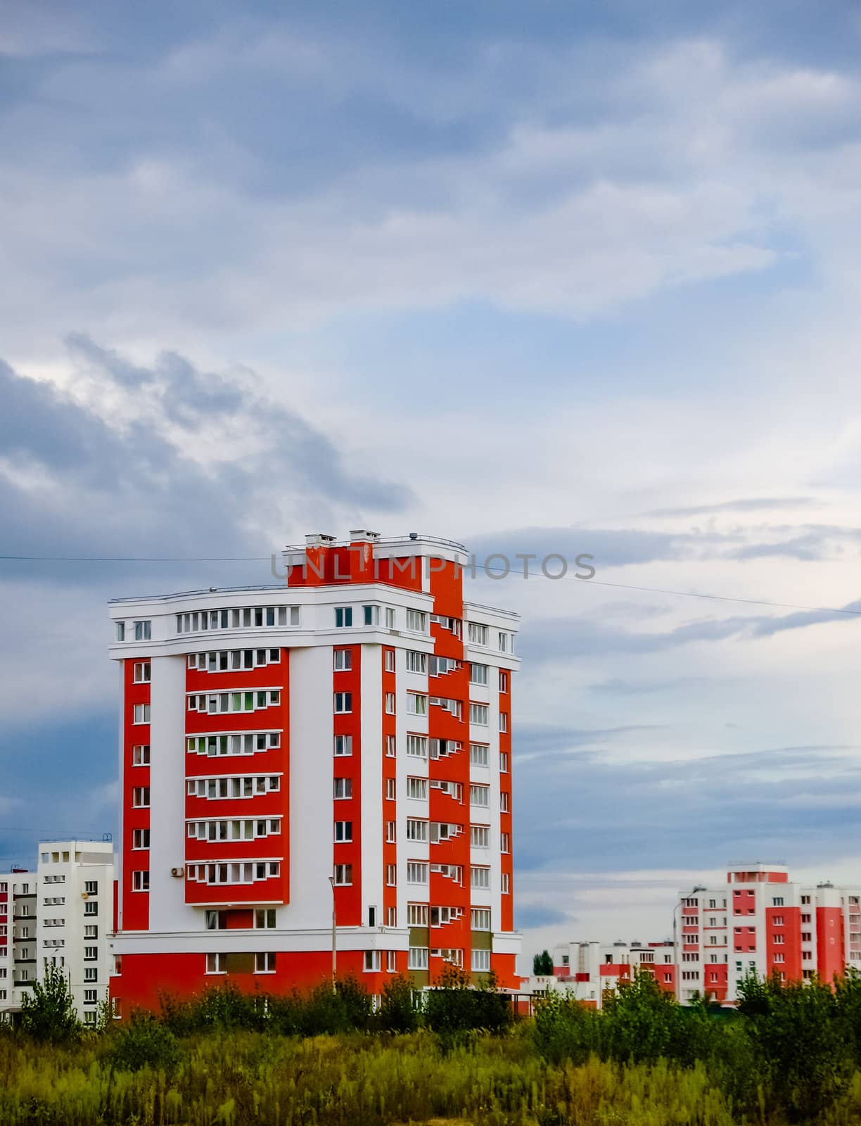 Buildings In A City In An Environment Of Green Trees