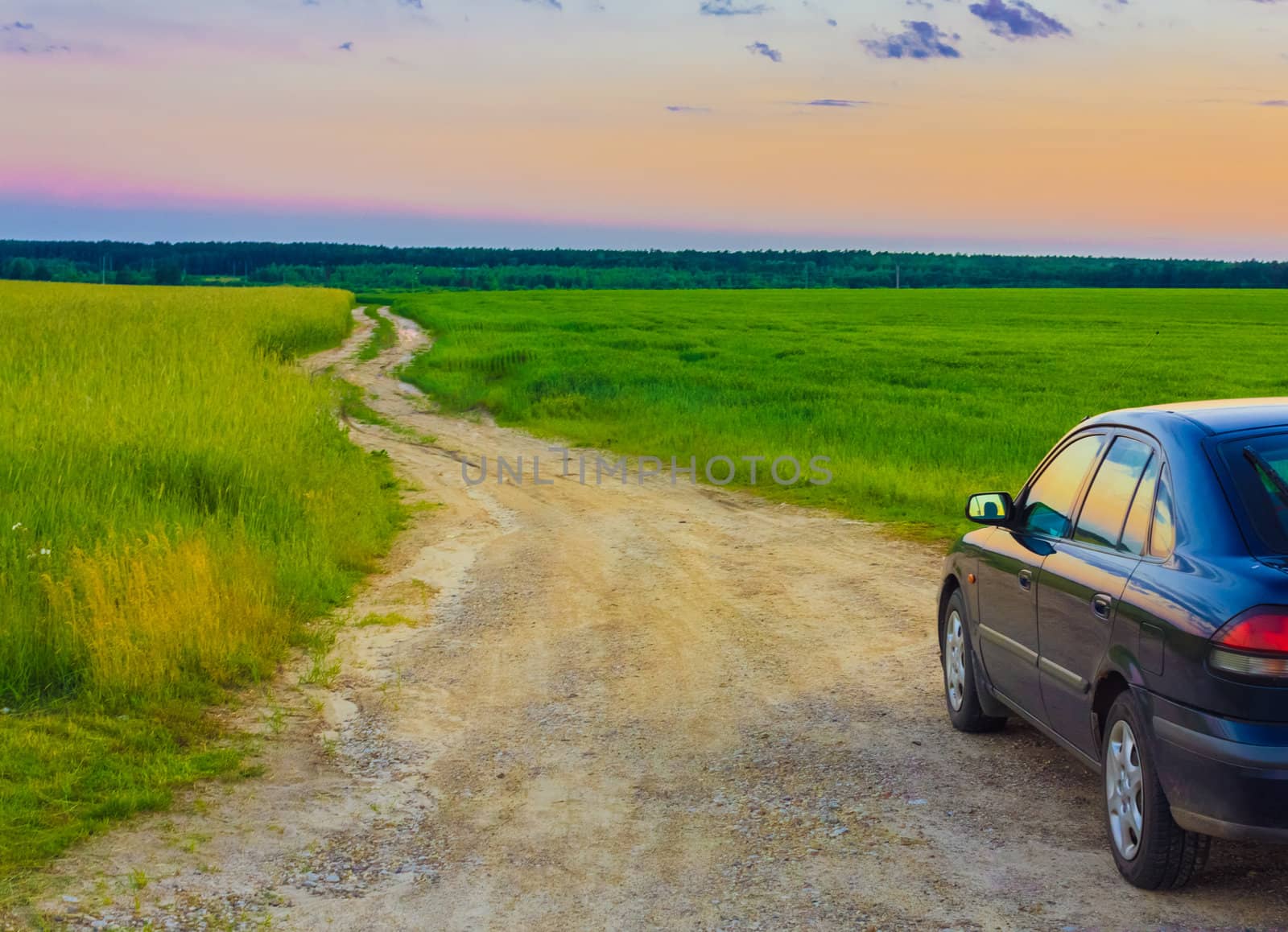 Dirty Rural Road And Car In Countryside.