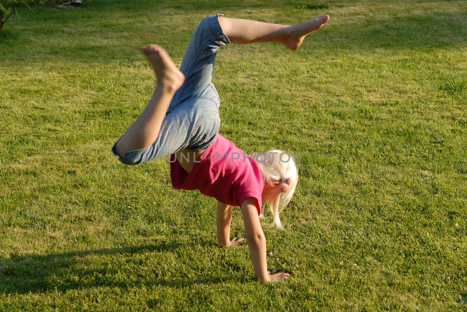 Handstand in the garden. Please note: No negative use allowed