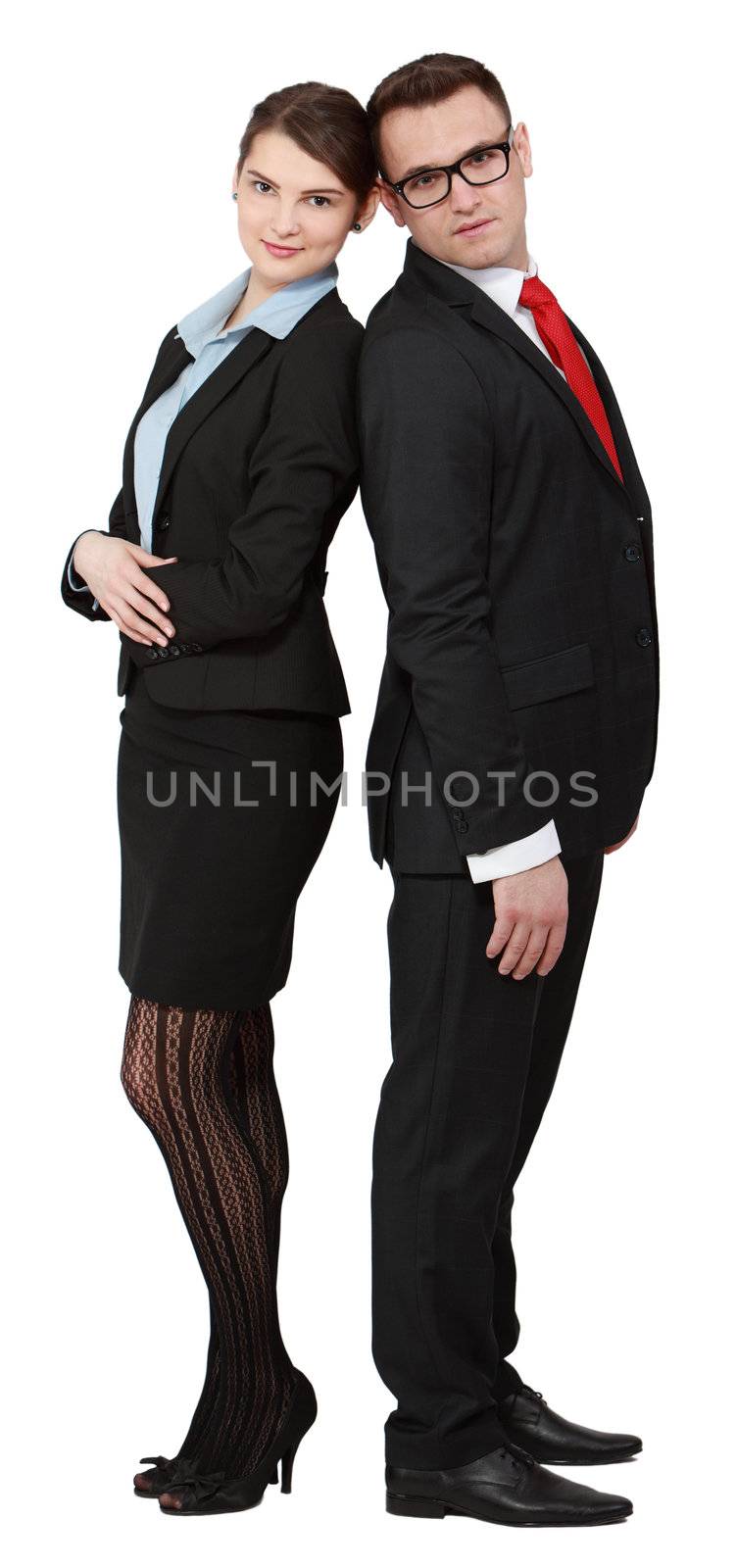 Young business couple standing back on back isolated against a white background.
