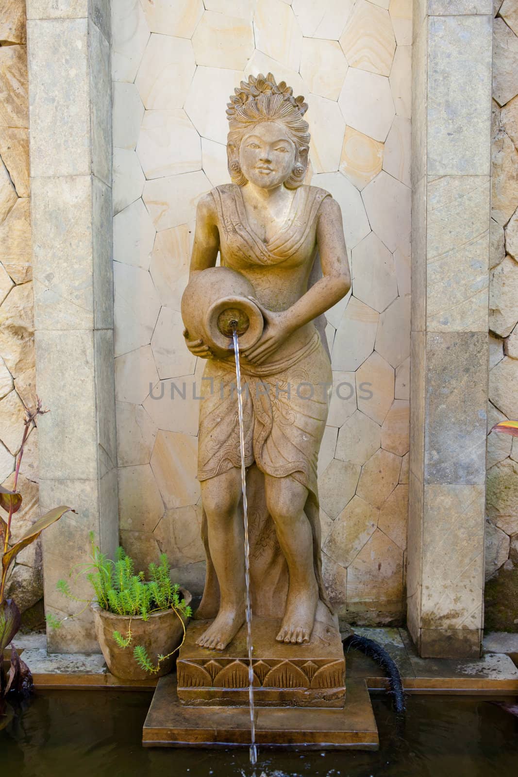 Water is released from the statues in Bali, Indonesia