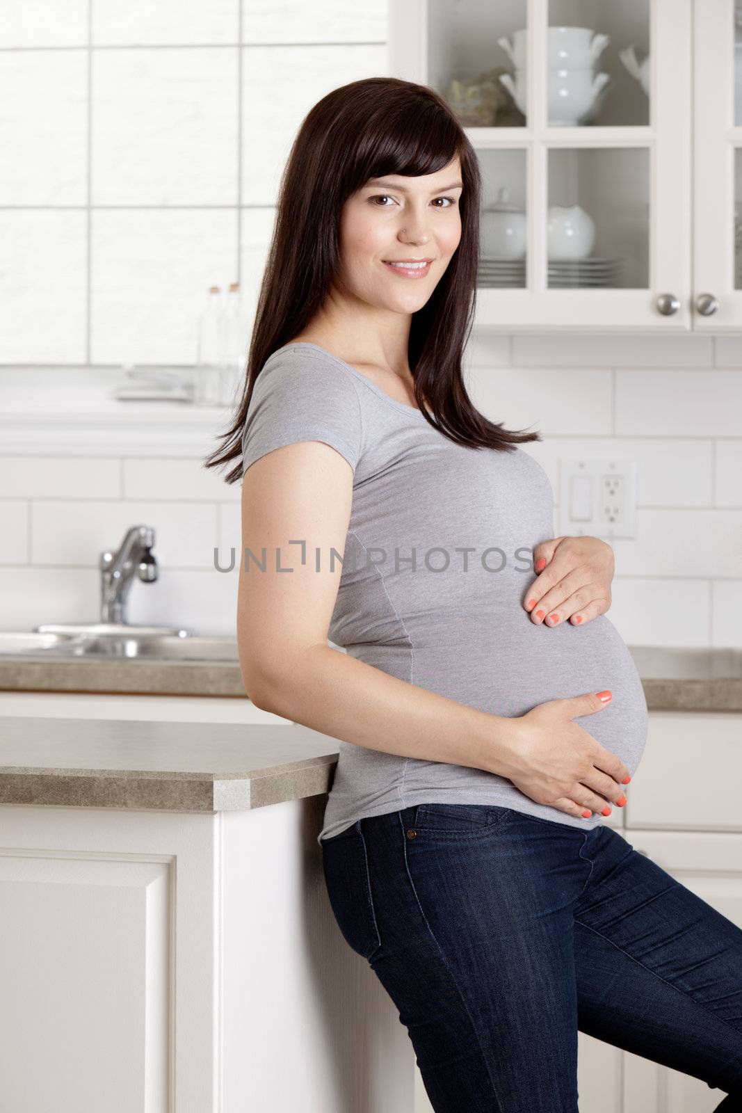 Pregnant Portrait in Kitchen by leaf