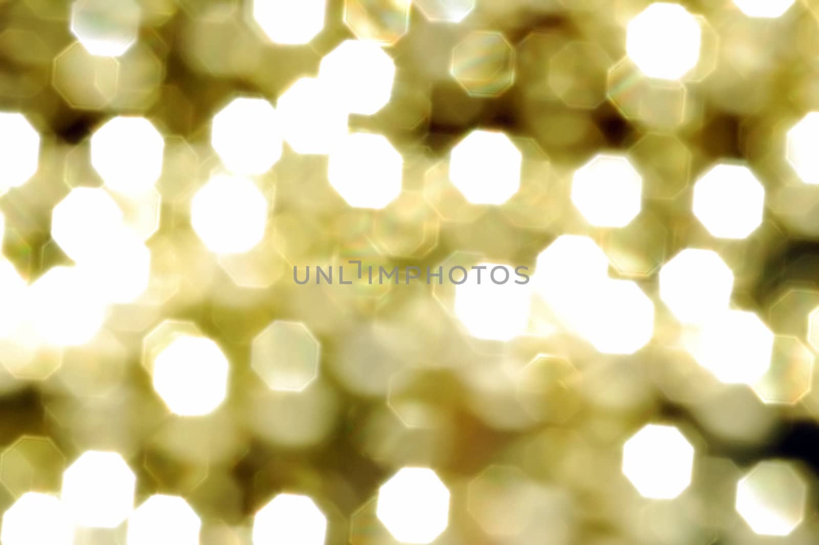 background of blurred golden christmas lights