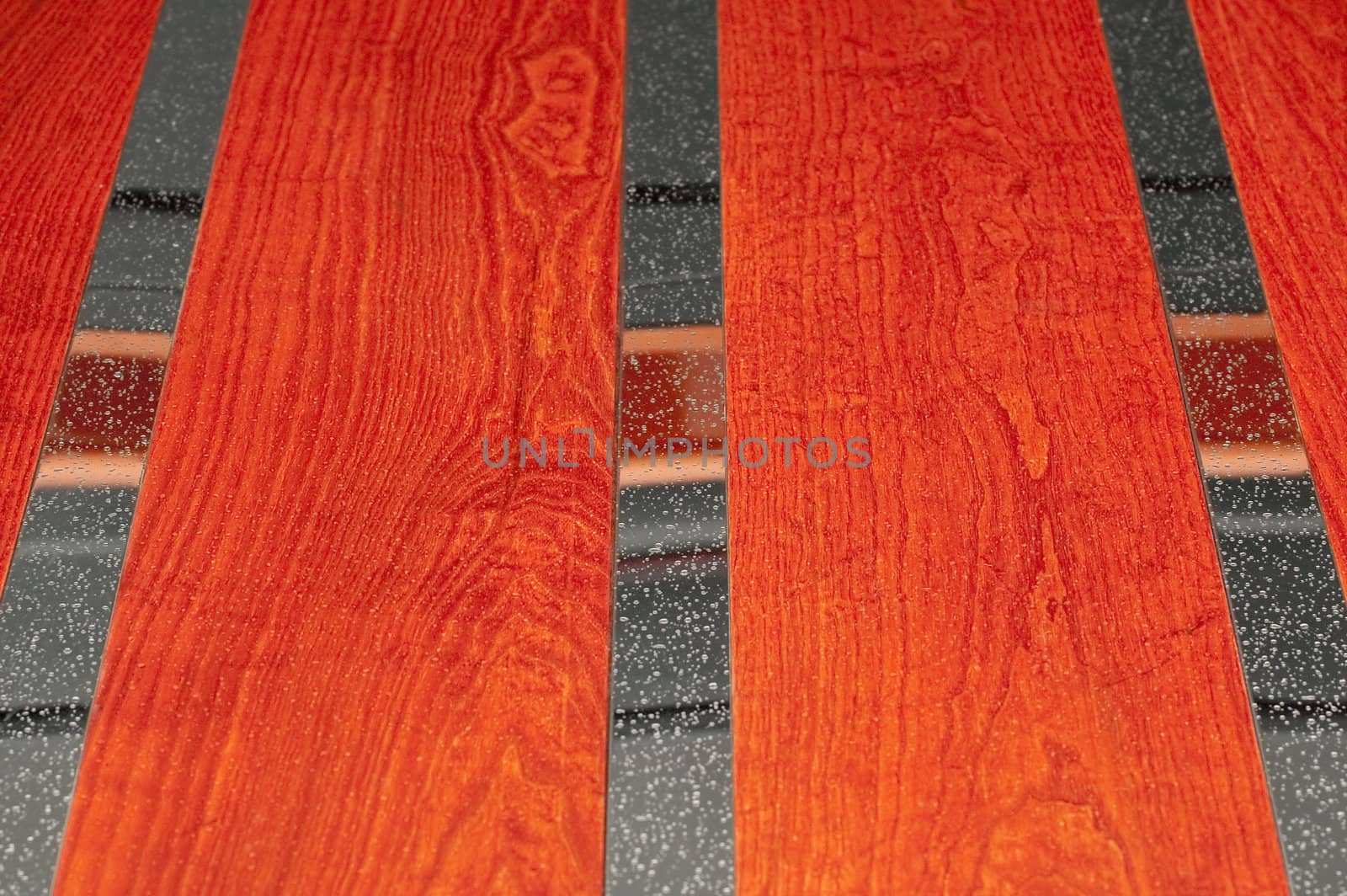 raindrops on a background of redwood and chrome