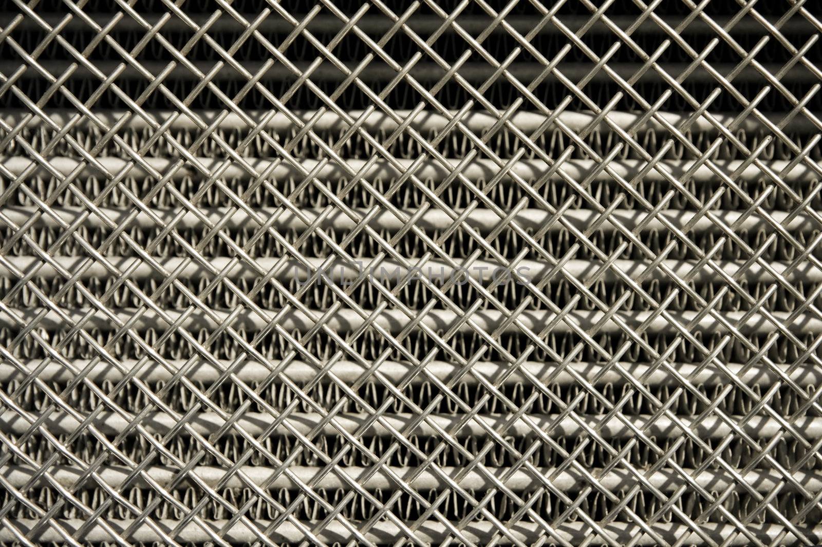 chromed vehicle radiator grille closeup
