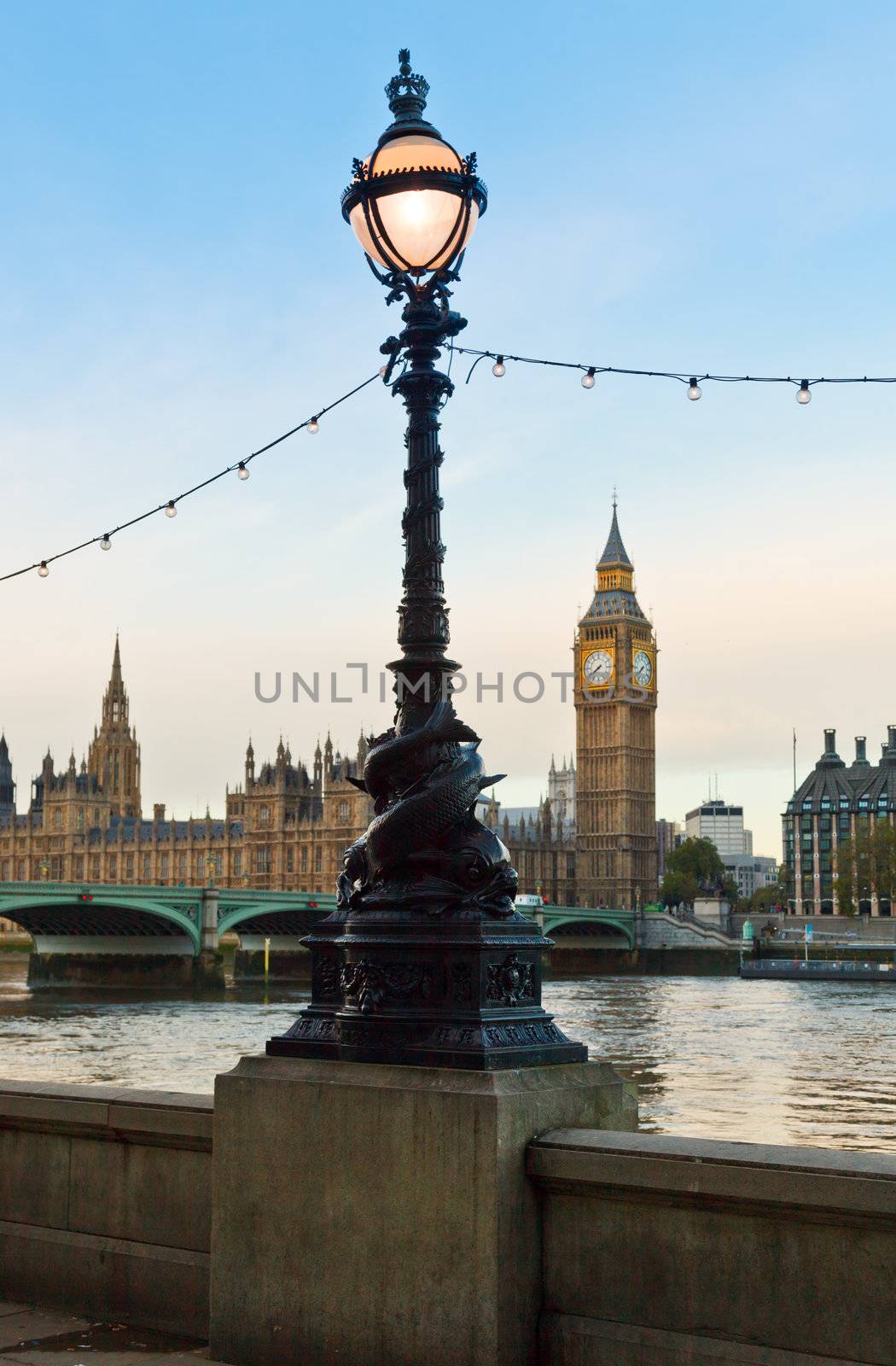 London cityscape with street lamp and Palace of Westminster in background