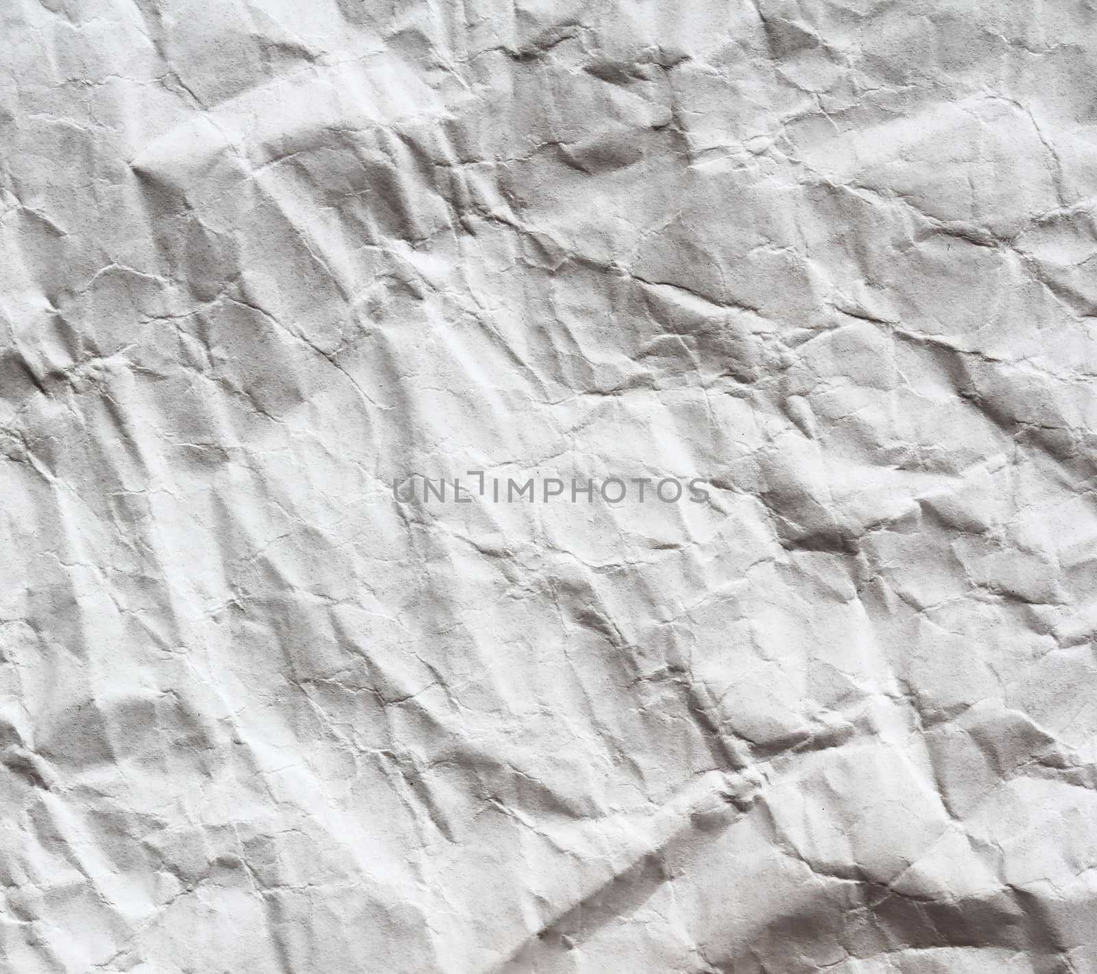 Crumpled white sheet. Paper background