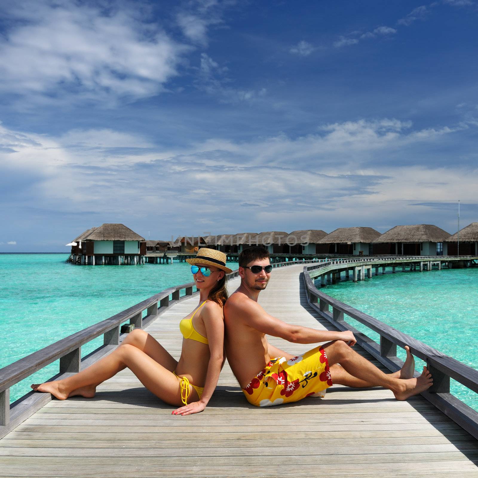 Couple on a tropical beach at Maldives