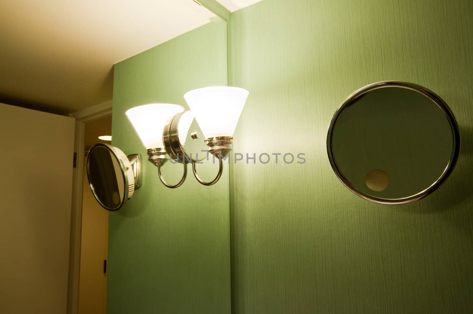 Light and shaving mirror in a bathroom