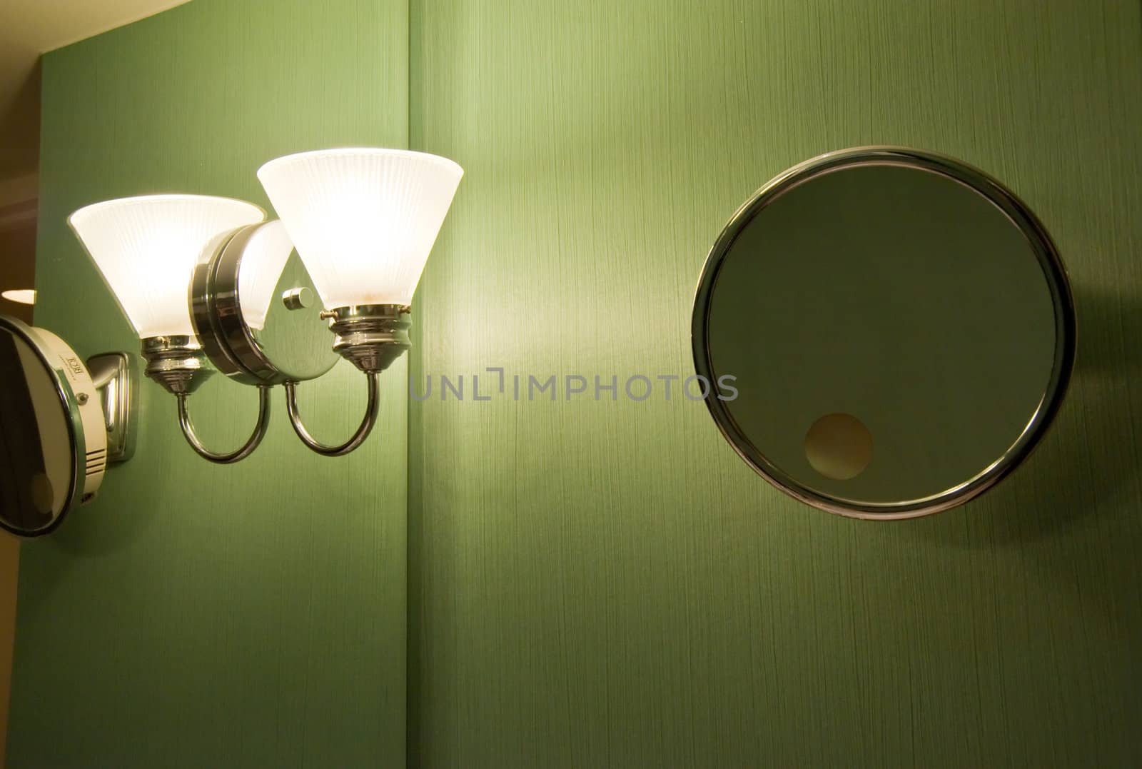 Light and shaving mirror in a bathroom