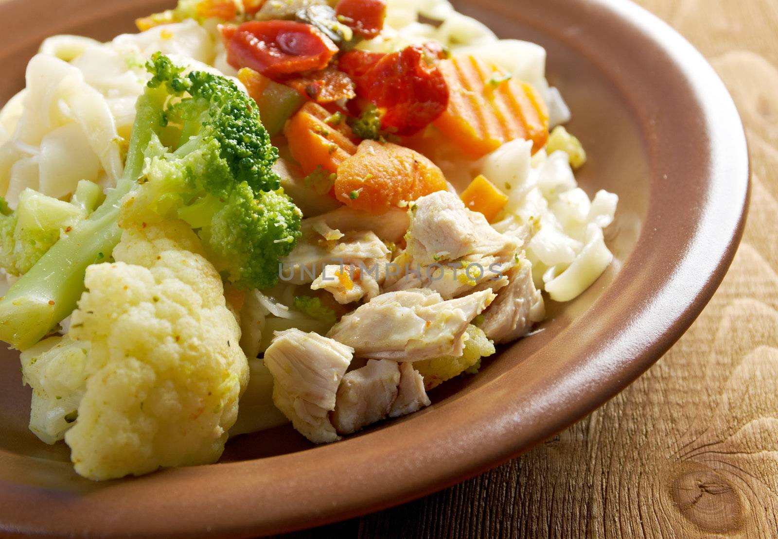 chicken breast with vegetables  with pasta tagliatelle