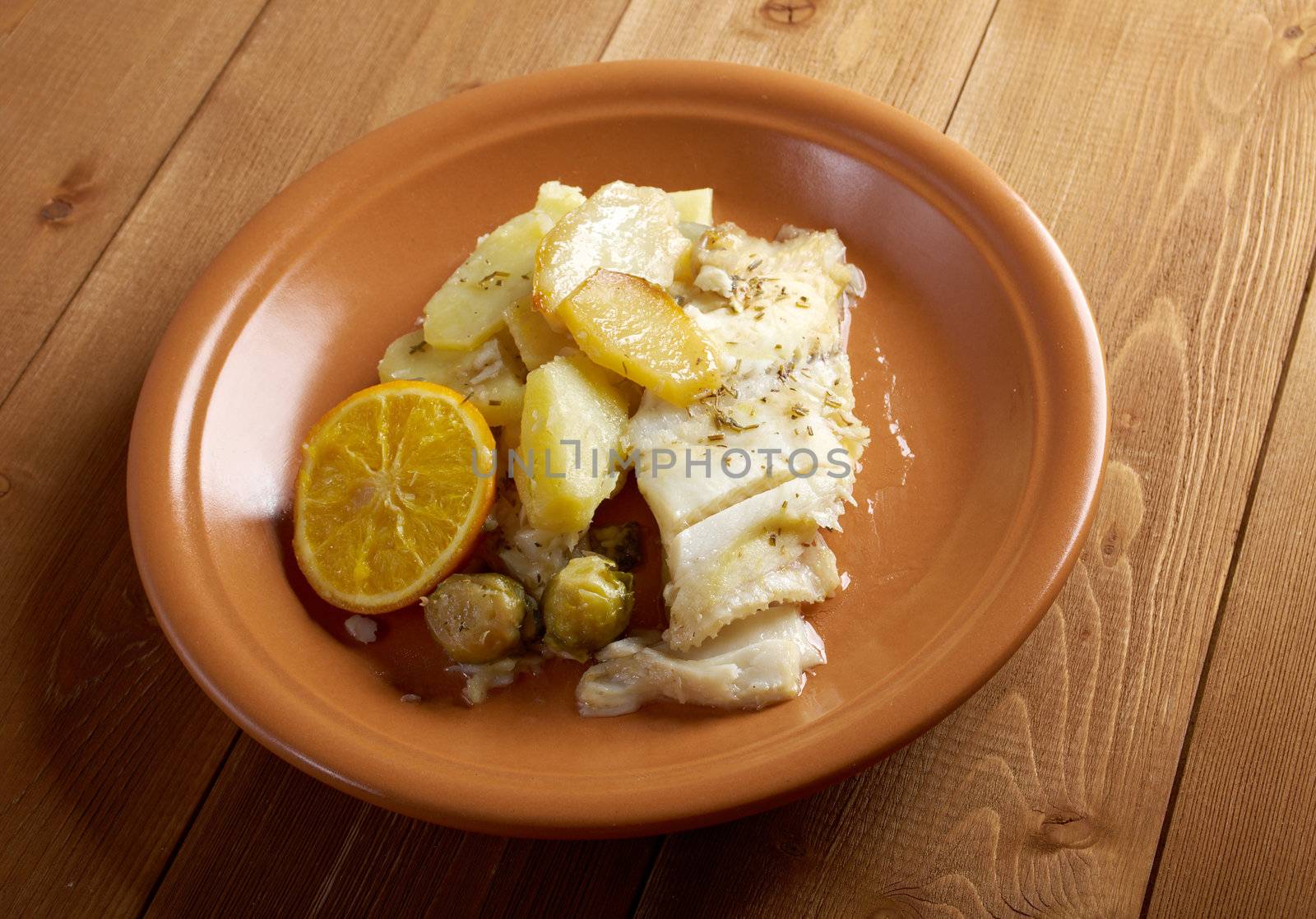 Fresh Halibut with sauce, potatoes,orange