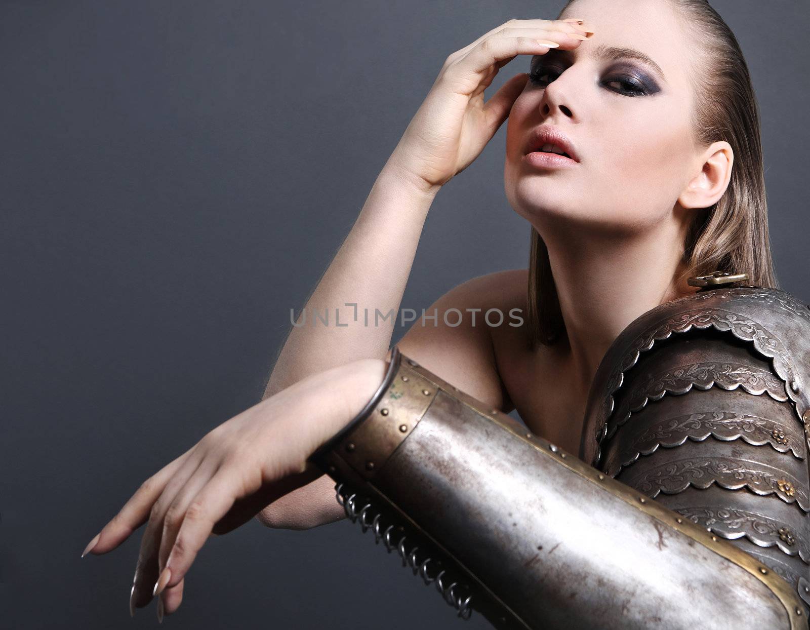 Portrait of a beautiful girl in armor