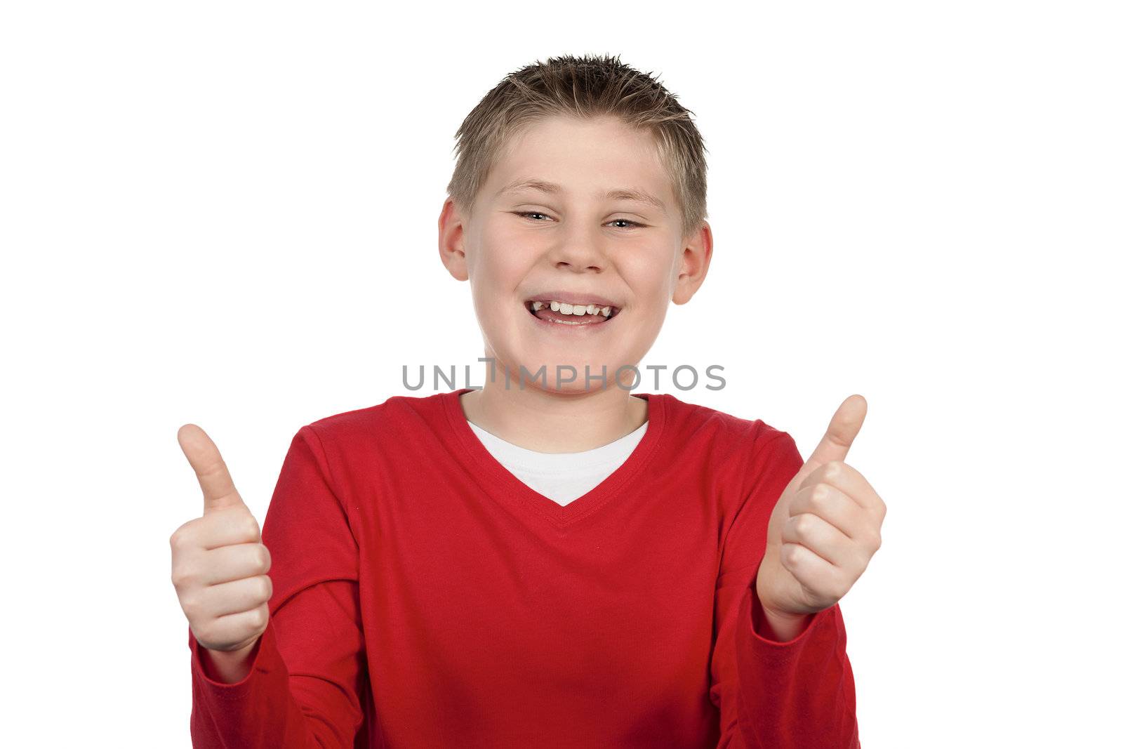 Young boy giving you thumbs up isolated on white background