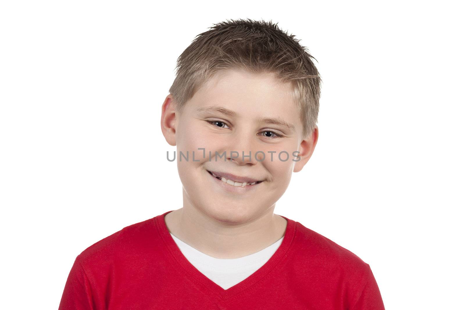 Portrait of a cute little boy smiling on white background