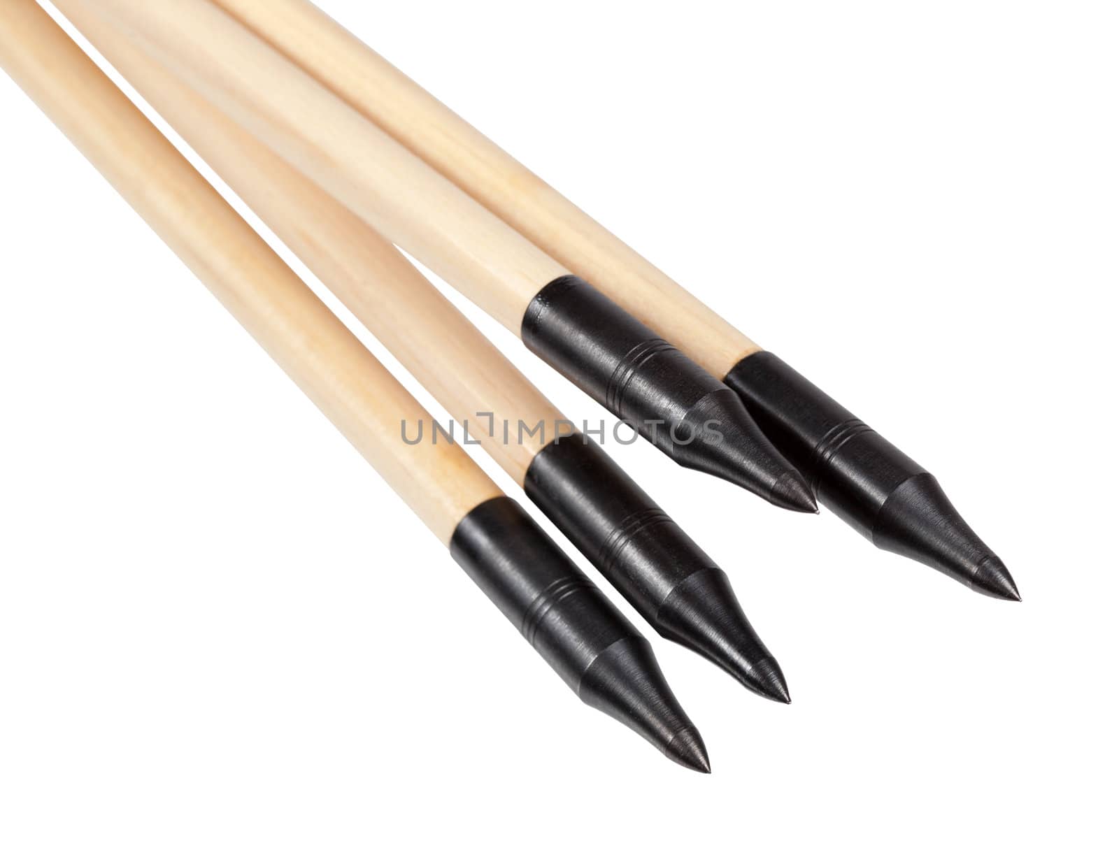A set of arrows made of wood with metal tips isolated on a white background