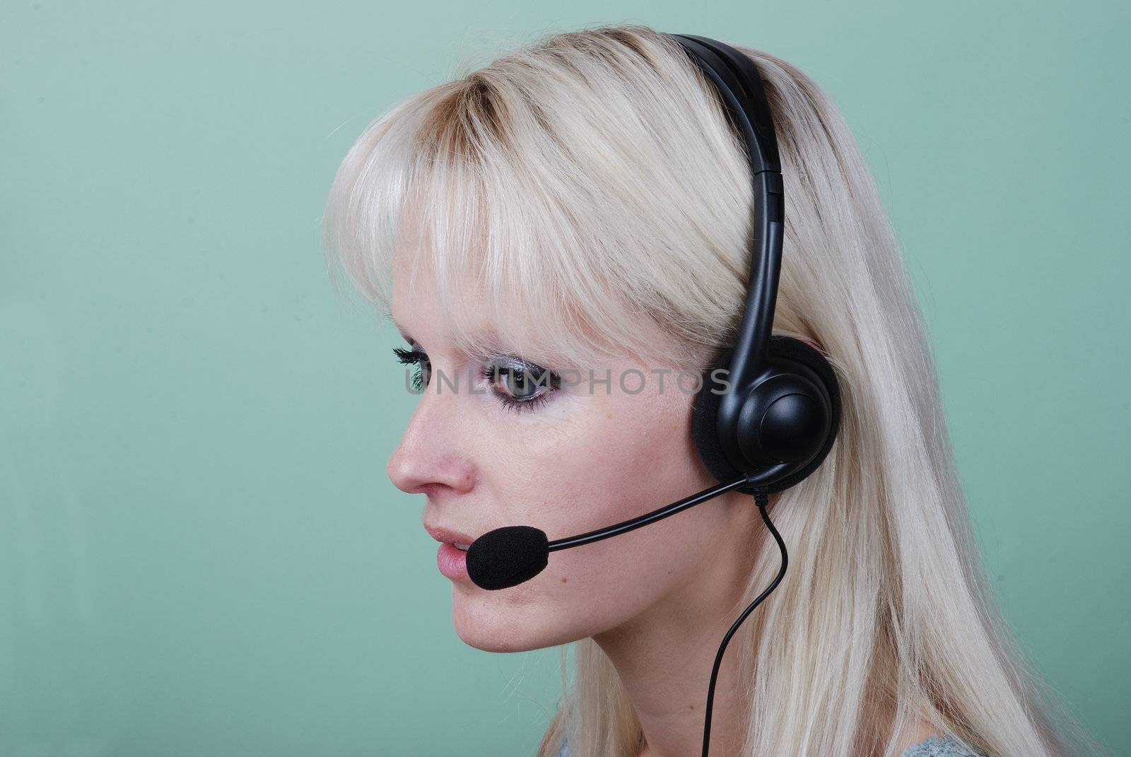 Portrait of young woman with headset