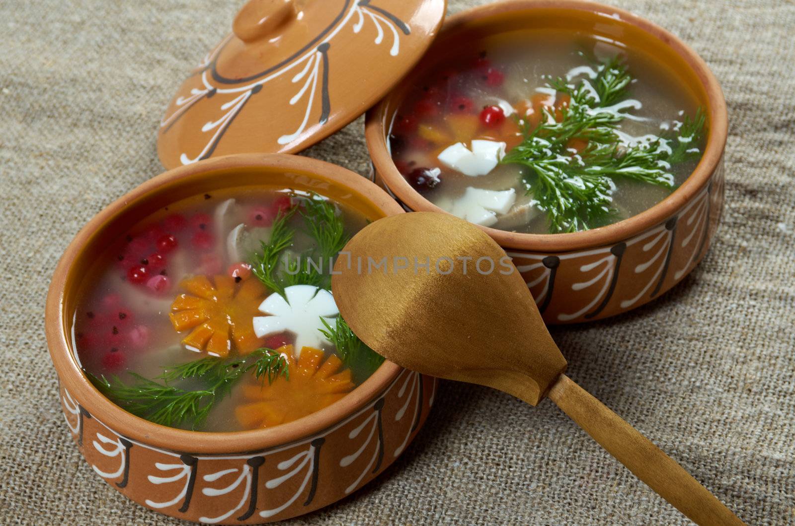 Aspic from meat decorated with egg, carrot,