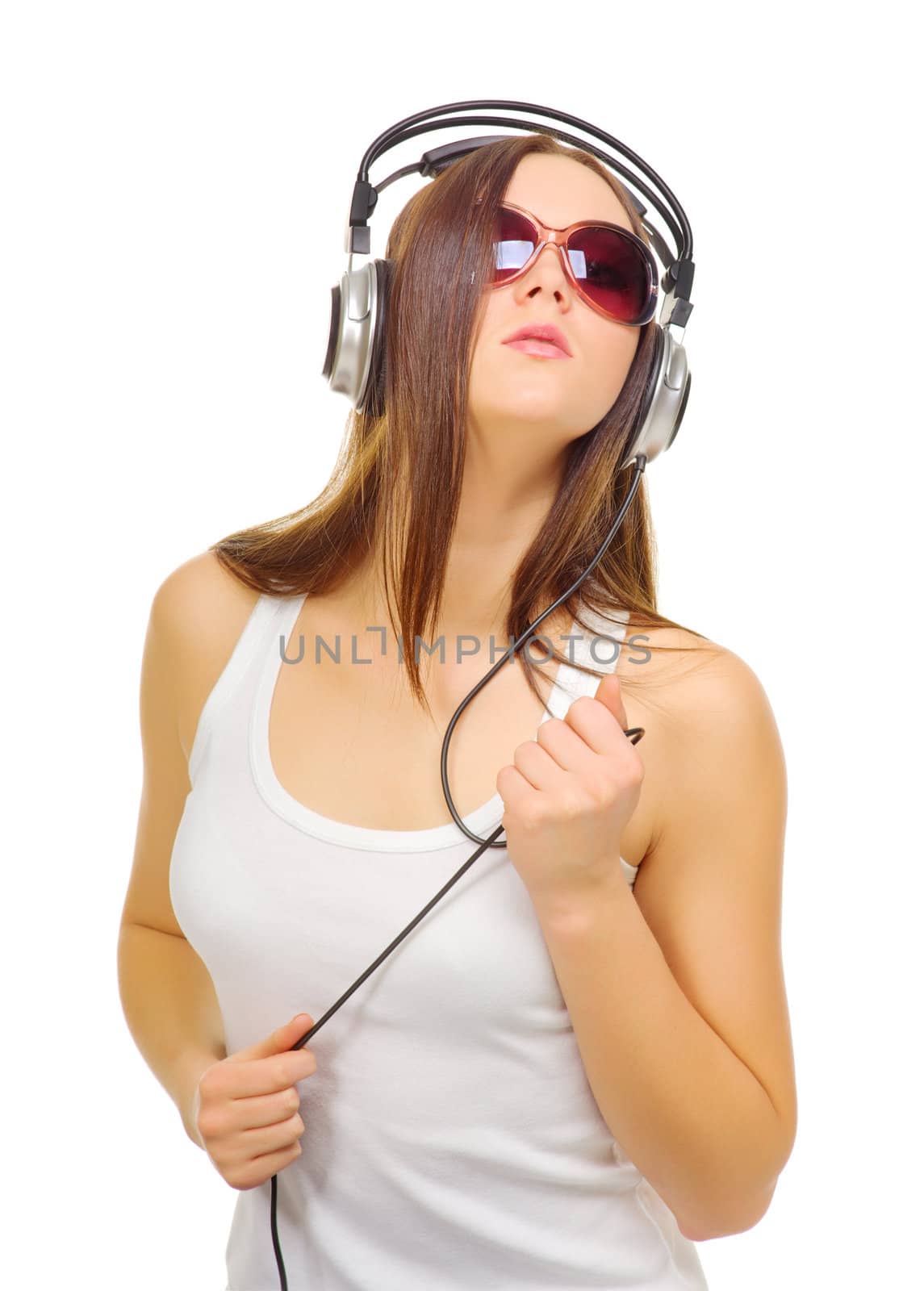 Young girl hear music by headphones isolated