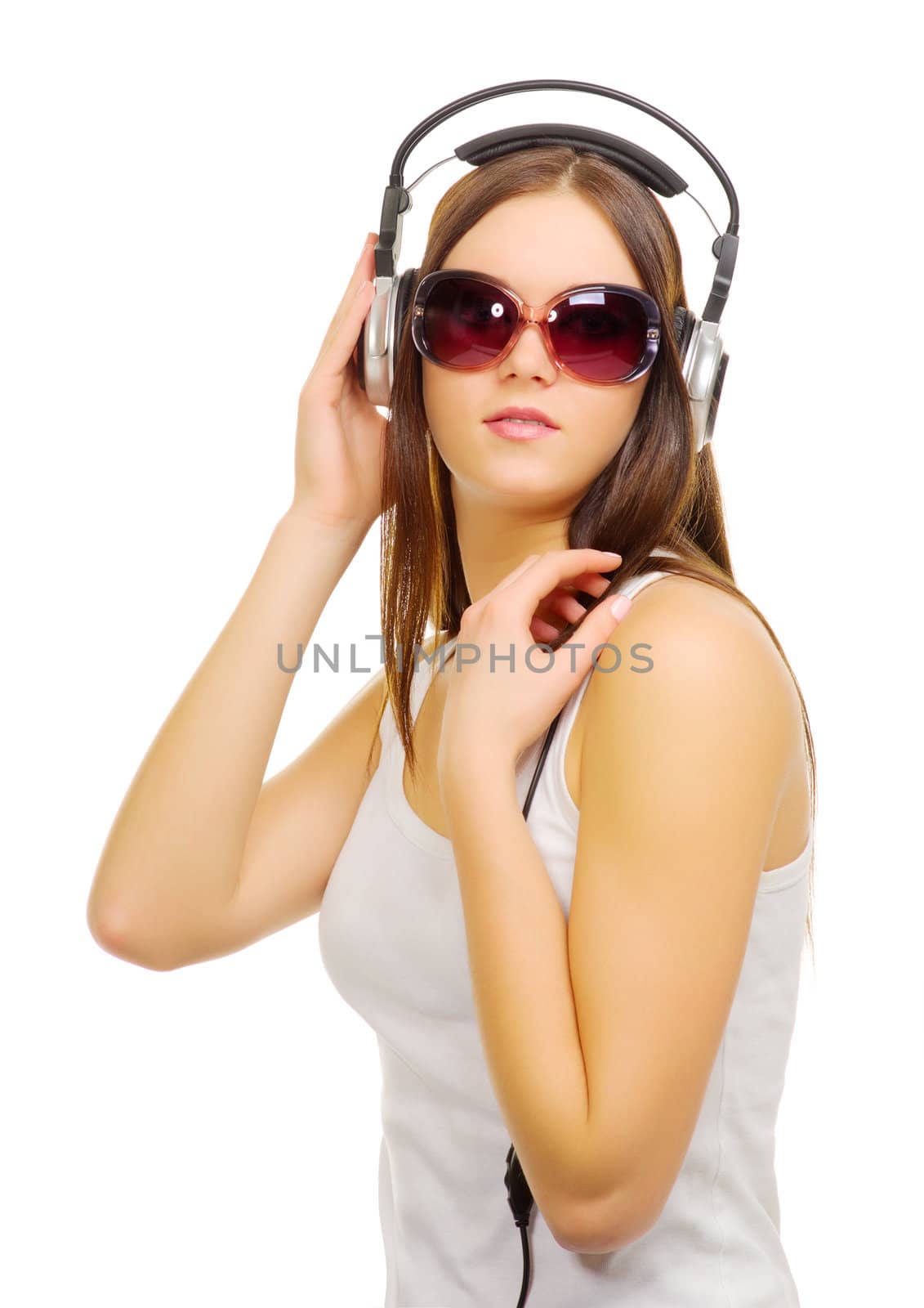 Young girl hear music by headphones isolated