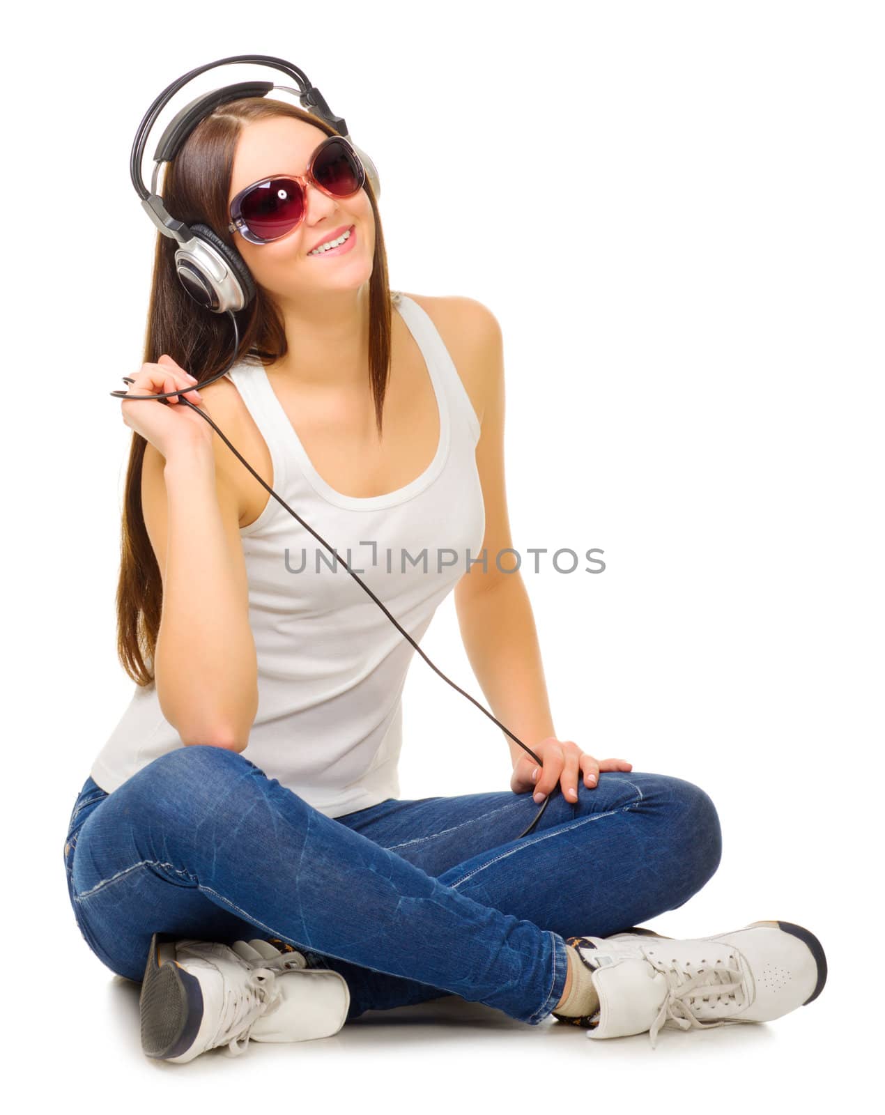 Young girl listen music isolated