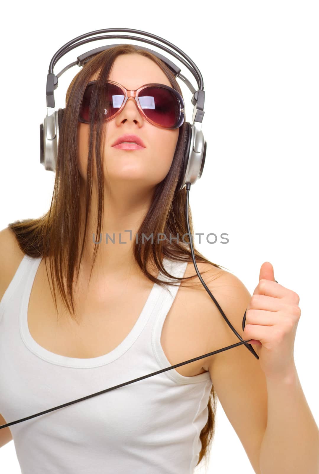 Young girl listen music isolated