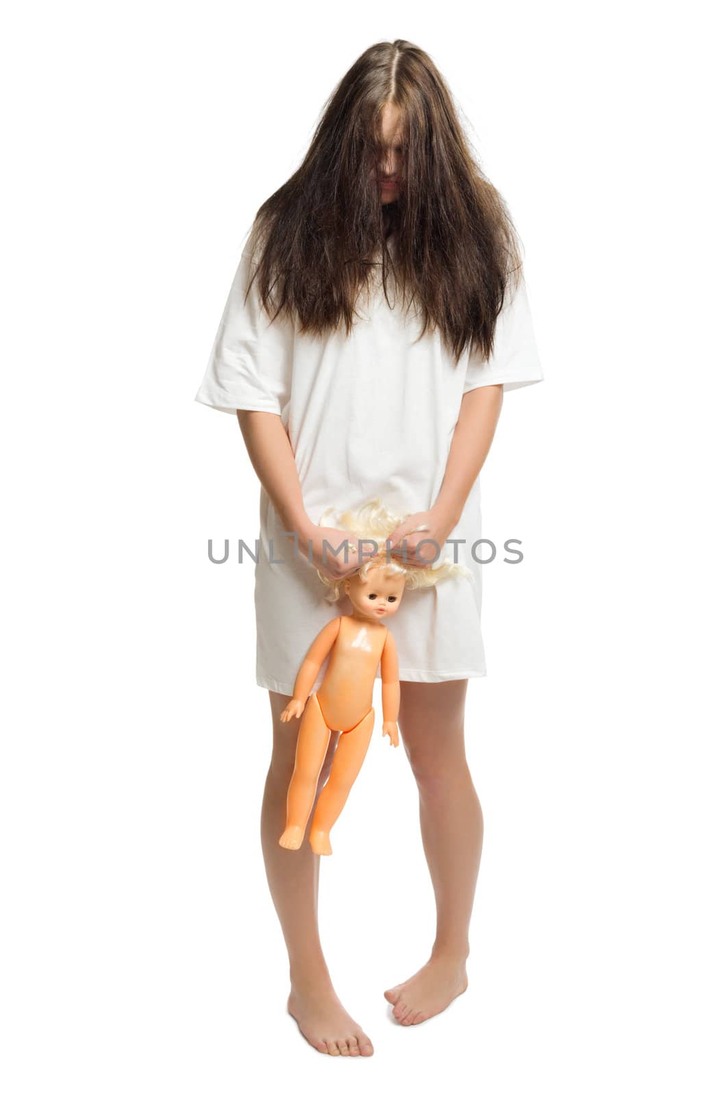 Zombie girl with plastic doll isolated