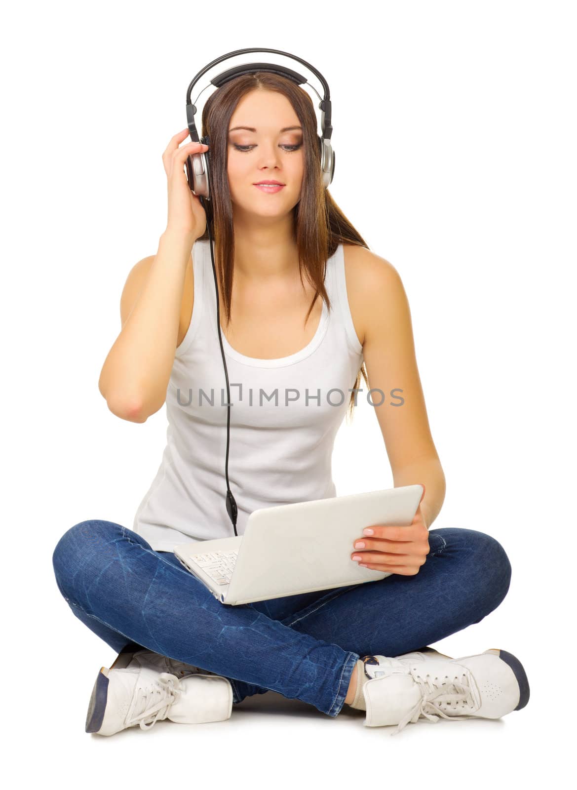 Young girl with headphones isolated
