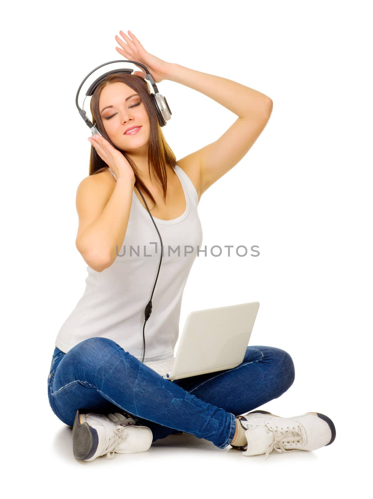 Young girl with headphones isolated