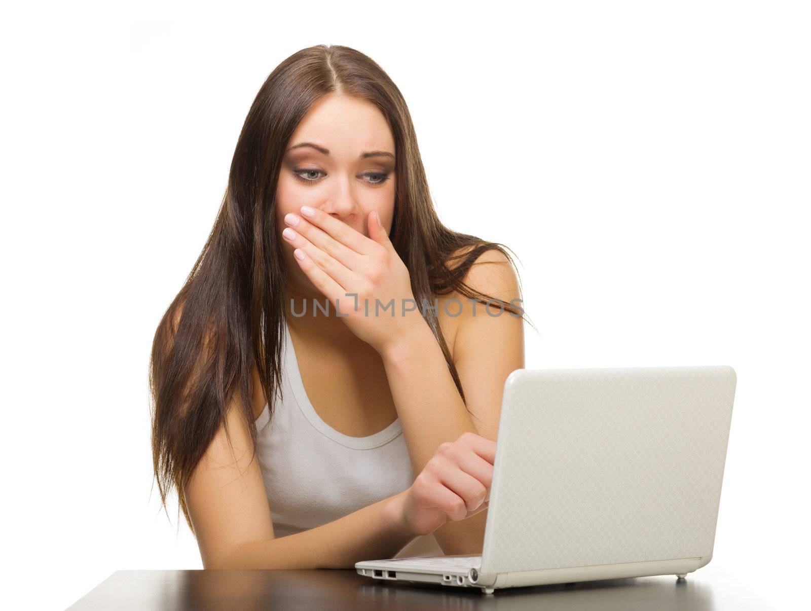 Young smiling girl with laptop isolated