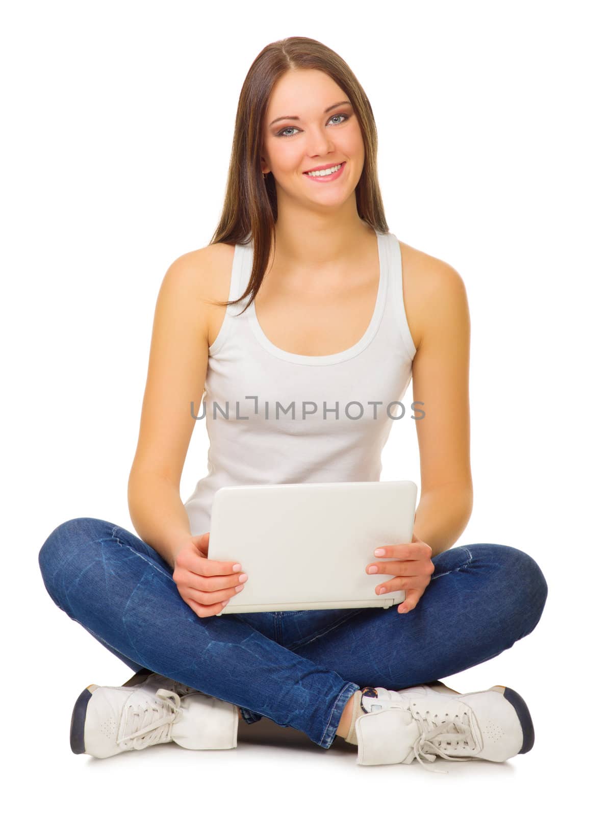 Young smiling girl with laptop isolated