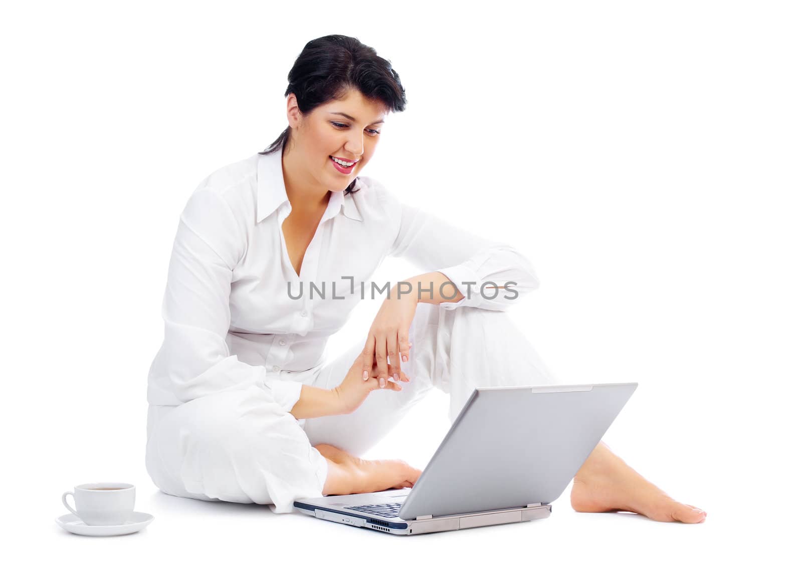 Woman with laptop and cup